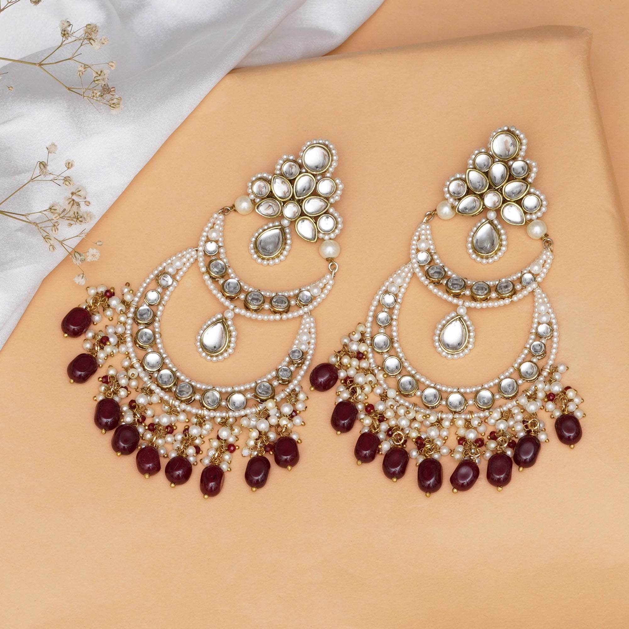 Traditional Kundan earrings in gold-tone, perfect for weddings and festive wear