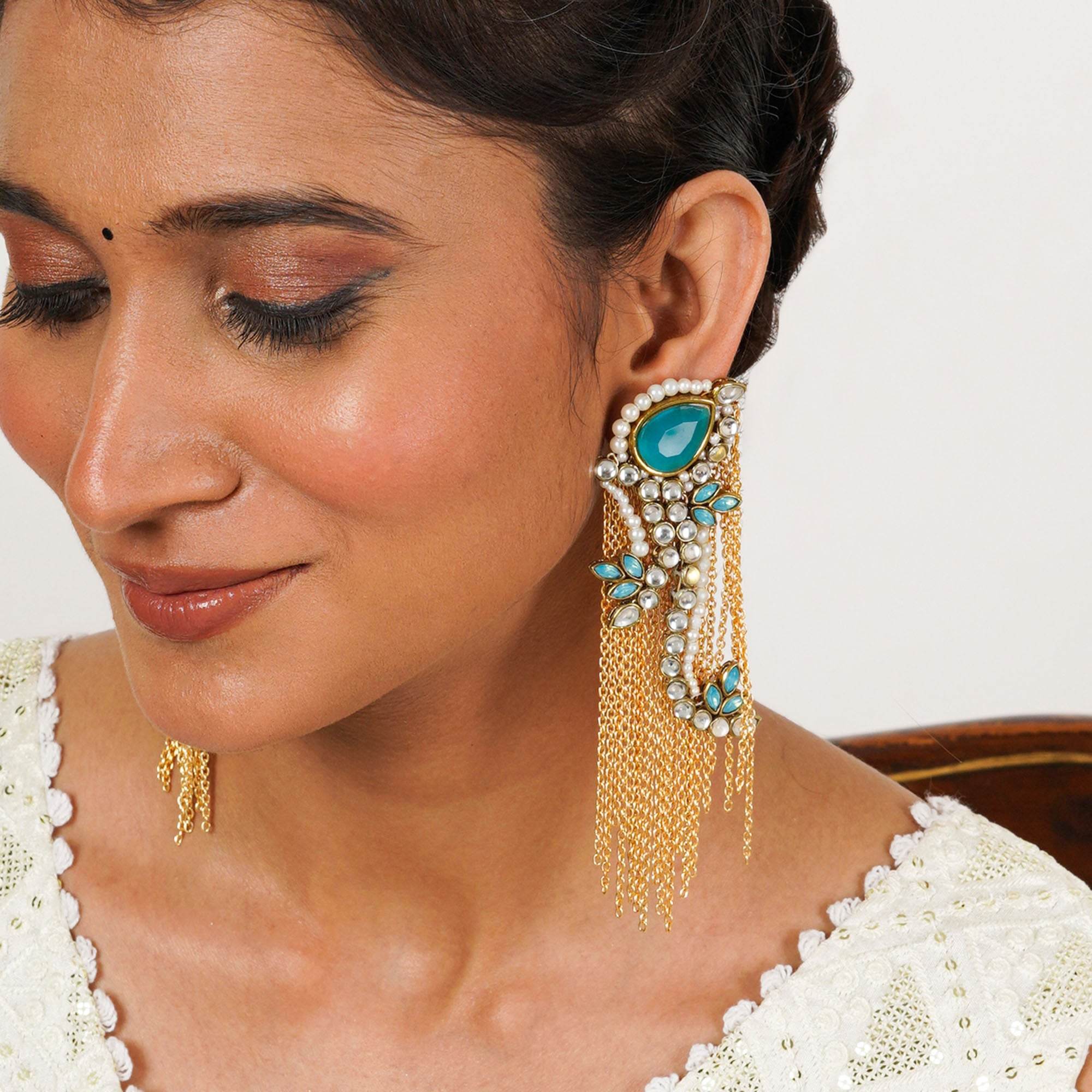 Traditional Kundan earrings in gold-tone, perfect for weddings and festive wear