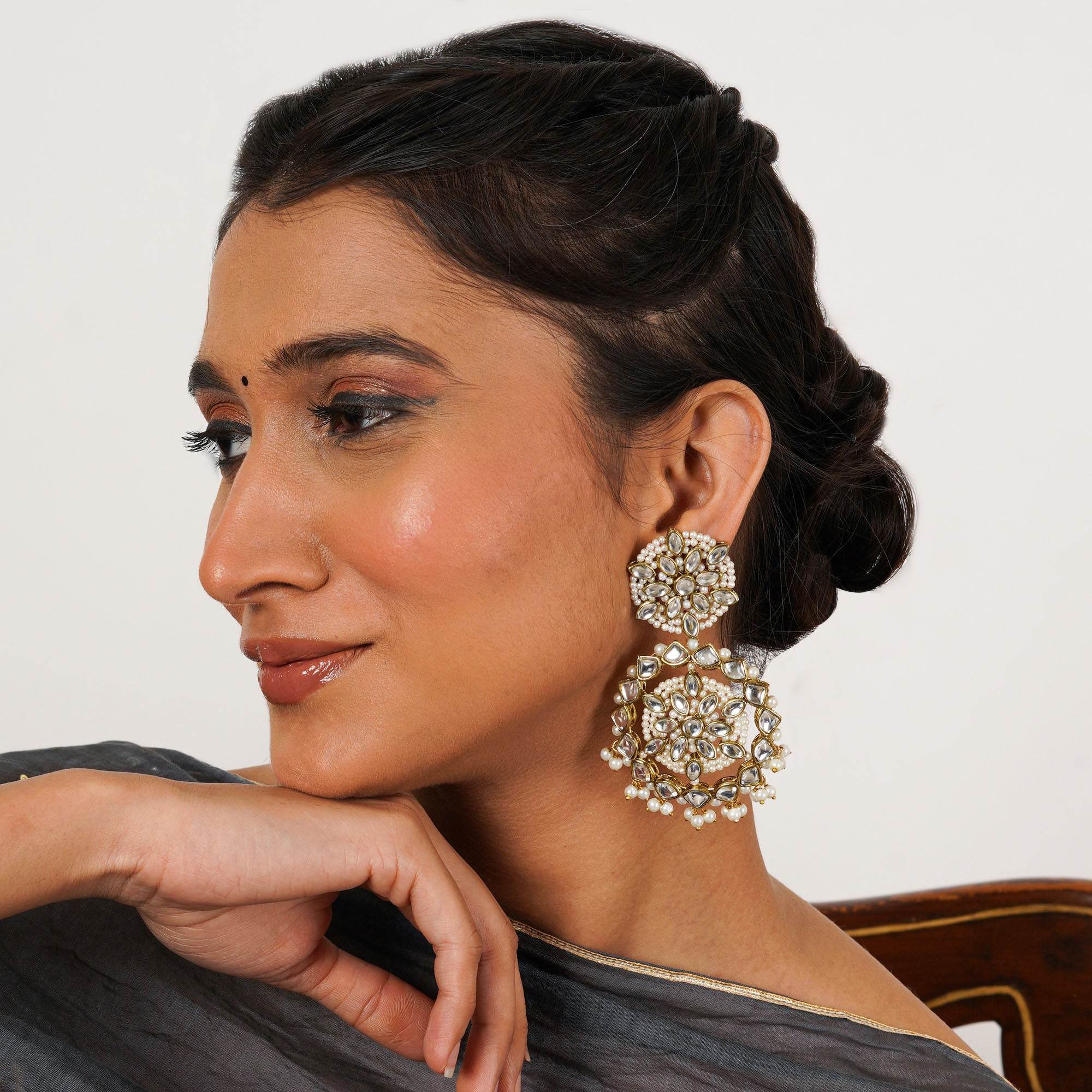 Traditional Kundan earrings in gold-tone, perfect for weddings and festive wear