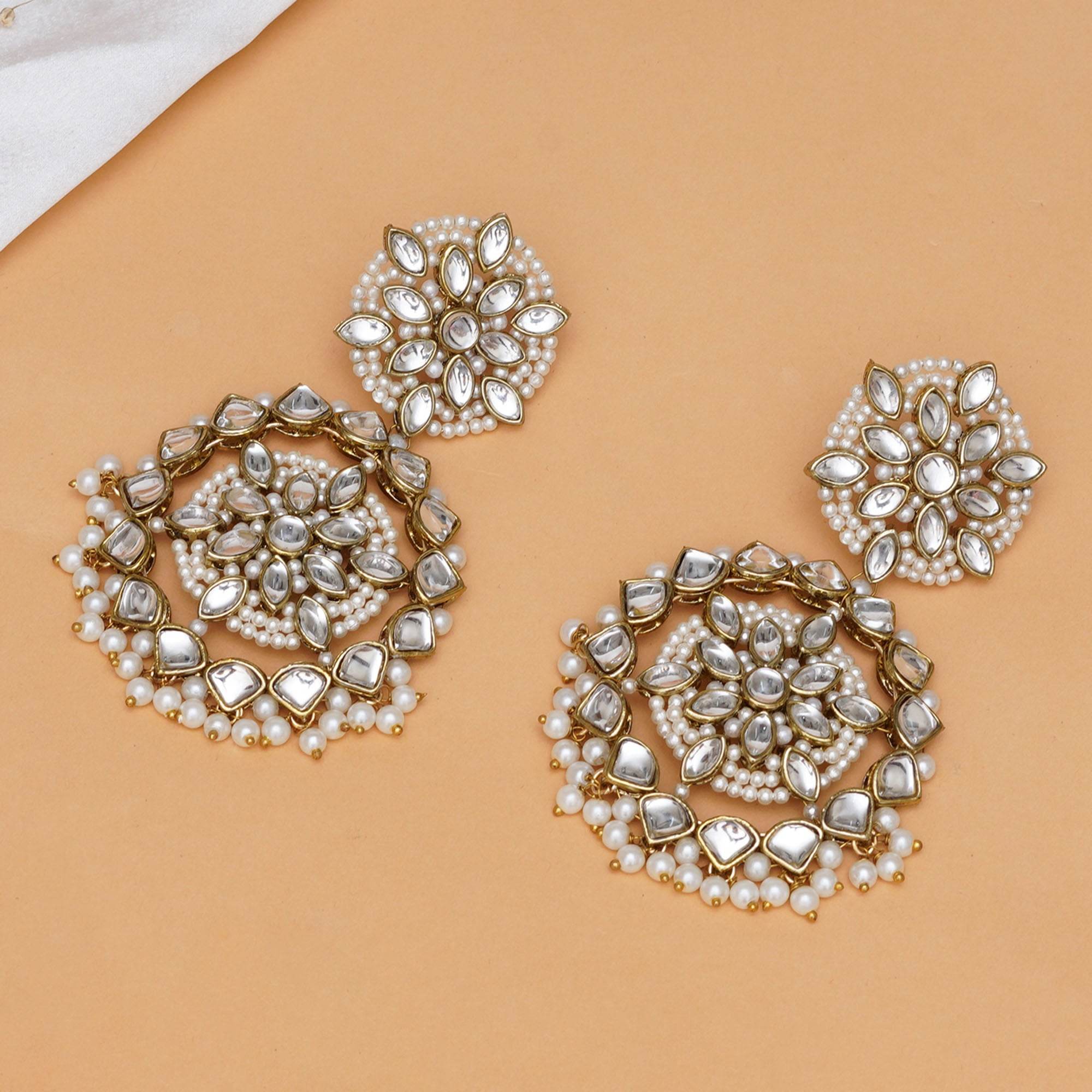 Traditional Kundan earrings in gold-tone, perfect for weddings and festive wear