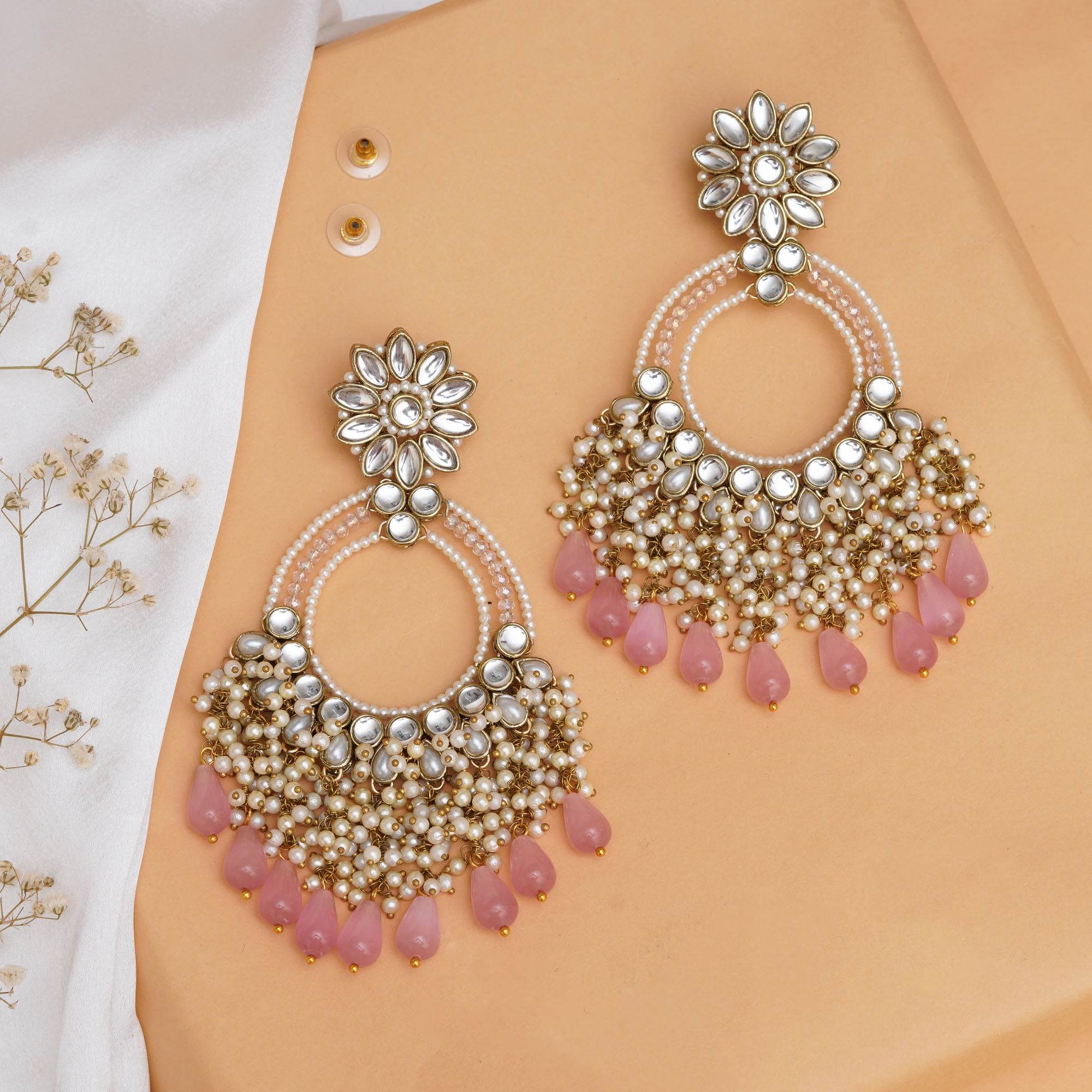 Traditional Kundan earrings in gold-tone, perfect for weddings and festive wear