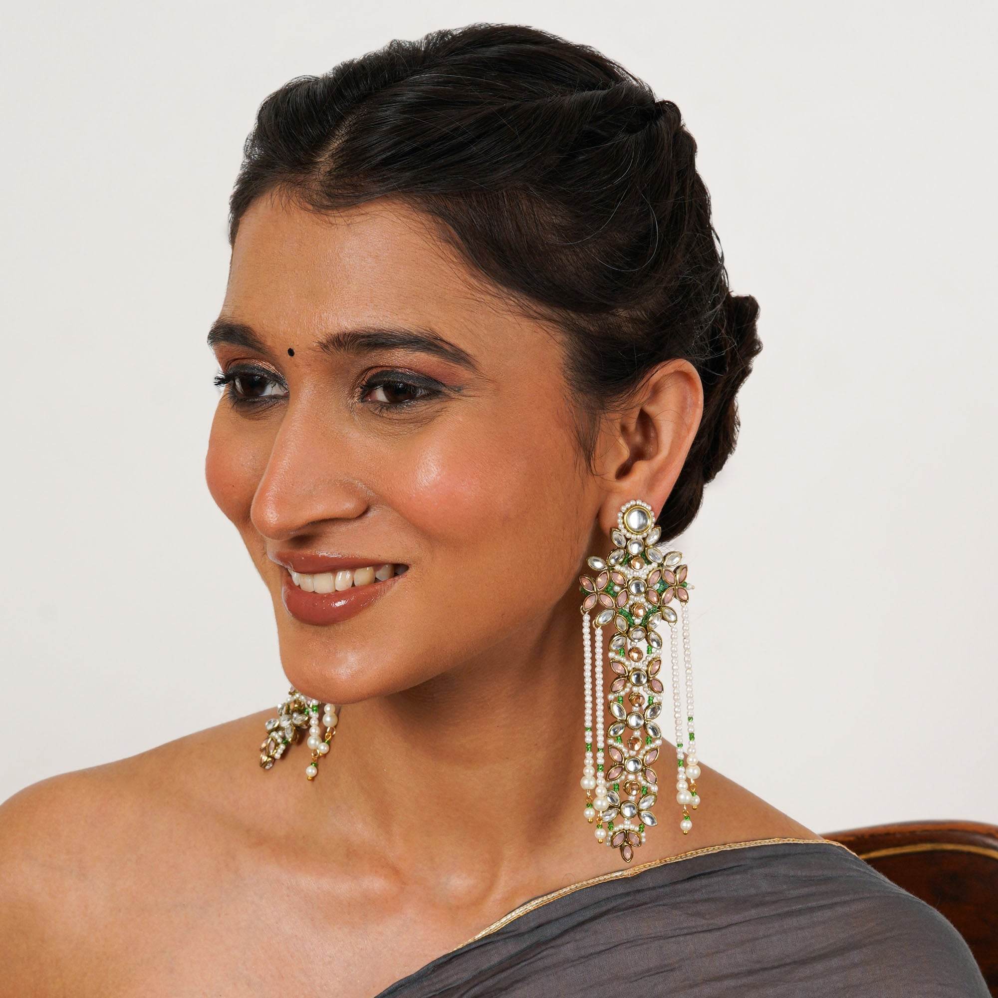 Traditional Kundan earrings in gold-tone, perfect for weddings and festive wear