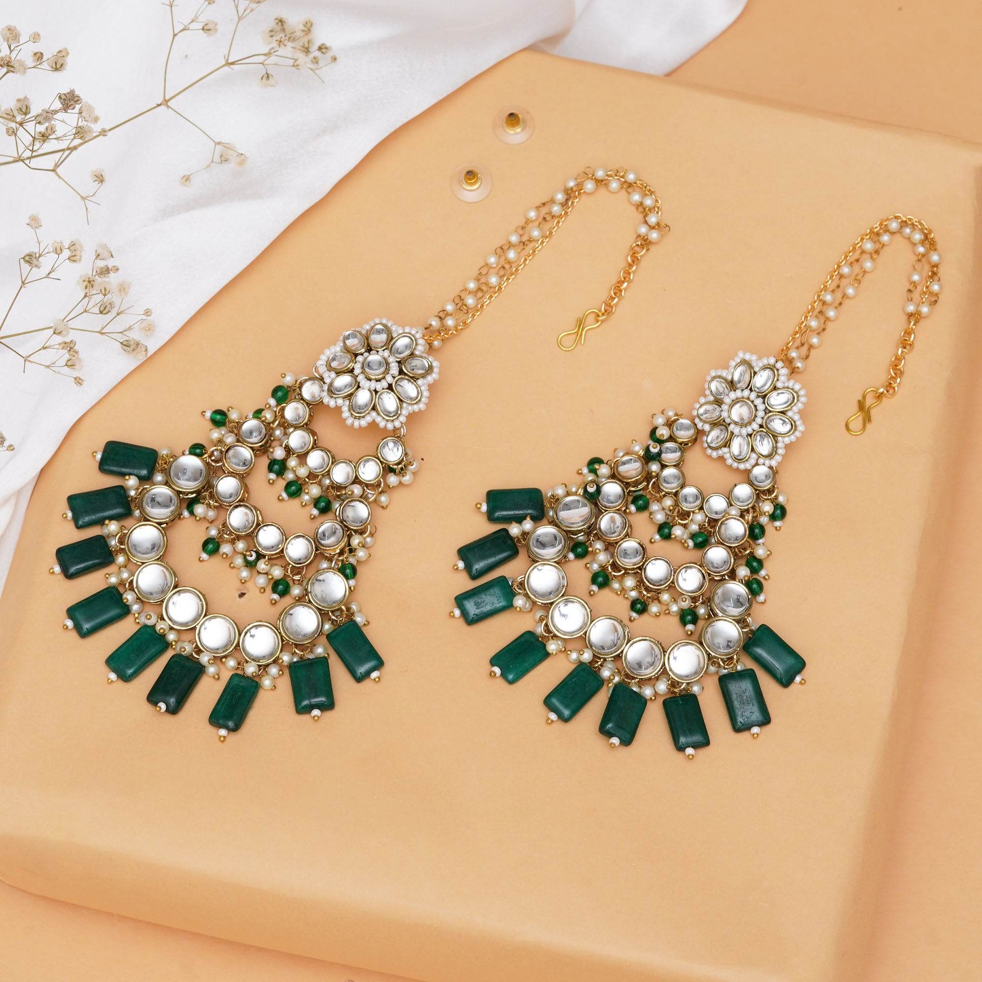 Traditional Kundan earrings in gold-tone, perfect for weddings and festive wear