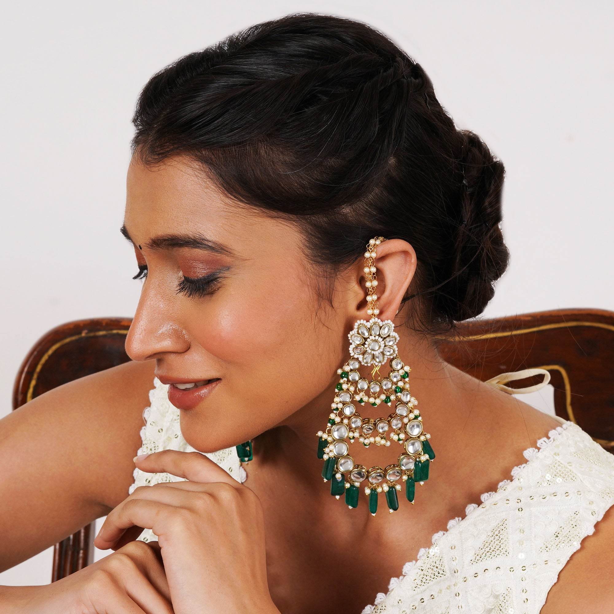Traditional Kundan earrings in gold-tone, perfect for weddings and festive wear