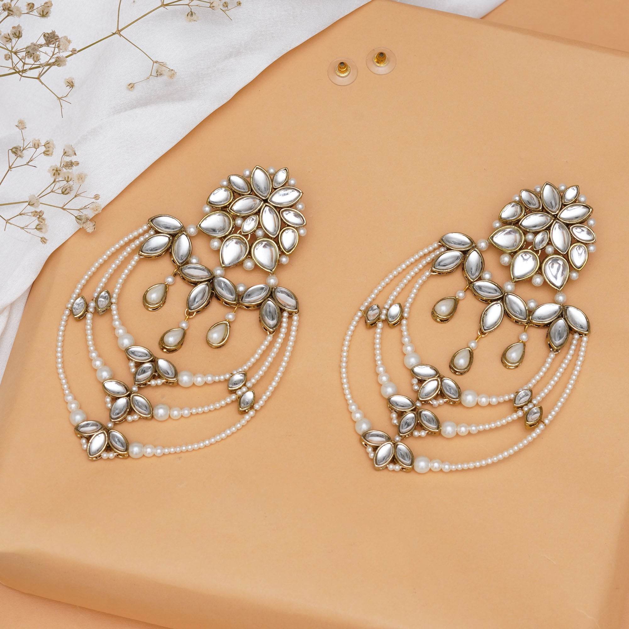 Traditional Kundan earrings in gold-tone, perfect for weddings and festive wear
