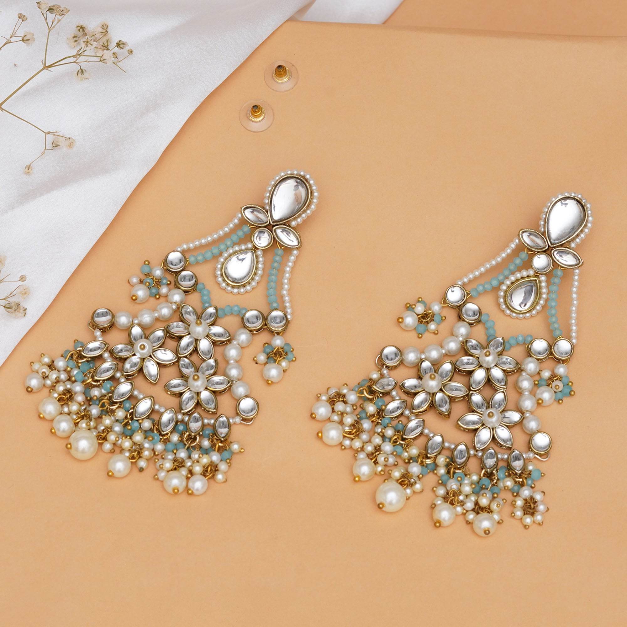 Traditional Kundan earrings in gold-tone, perfect for weddings and festive wear