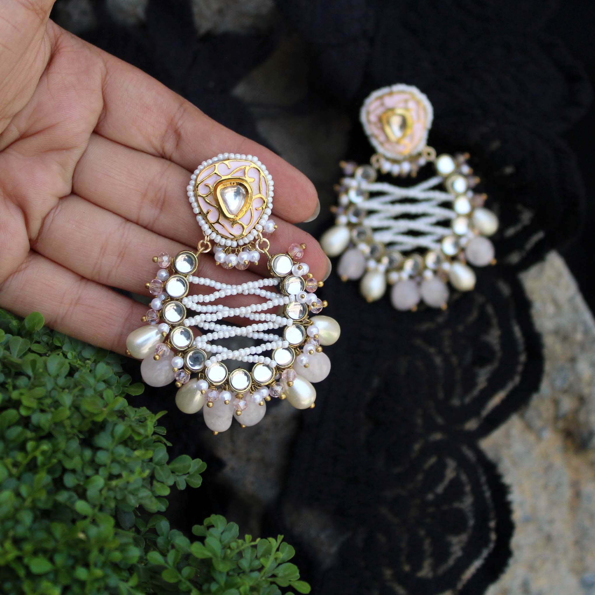 Traditional Kundan earrings in gold-tone, perfect for weddings and festive wear