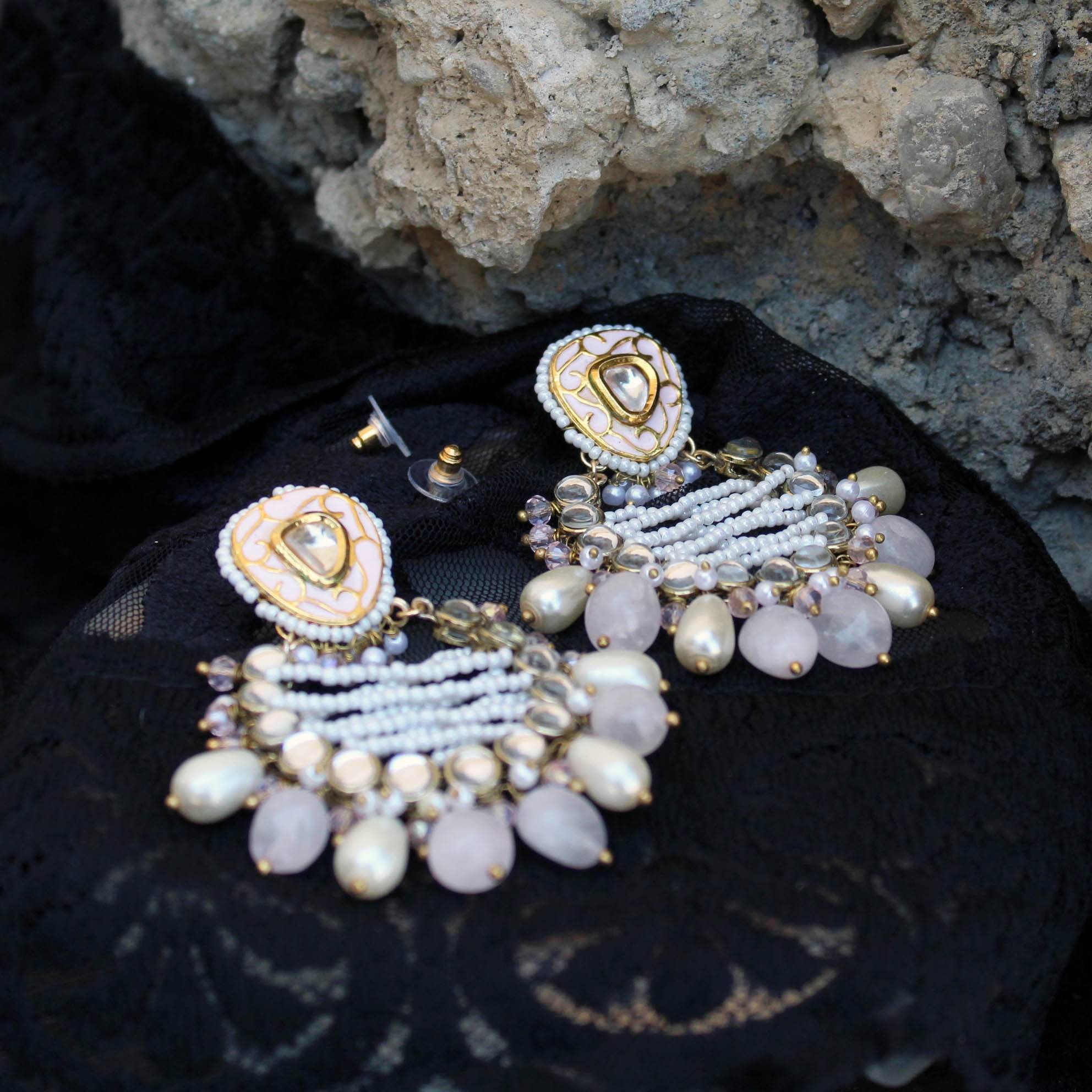 Traditional Kundan earrings in gold-tone, perfect for weddings and festive wear