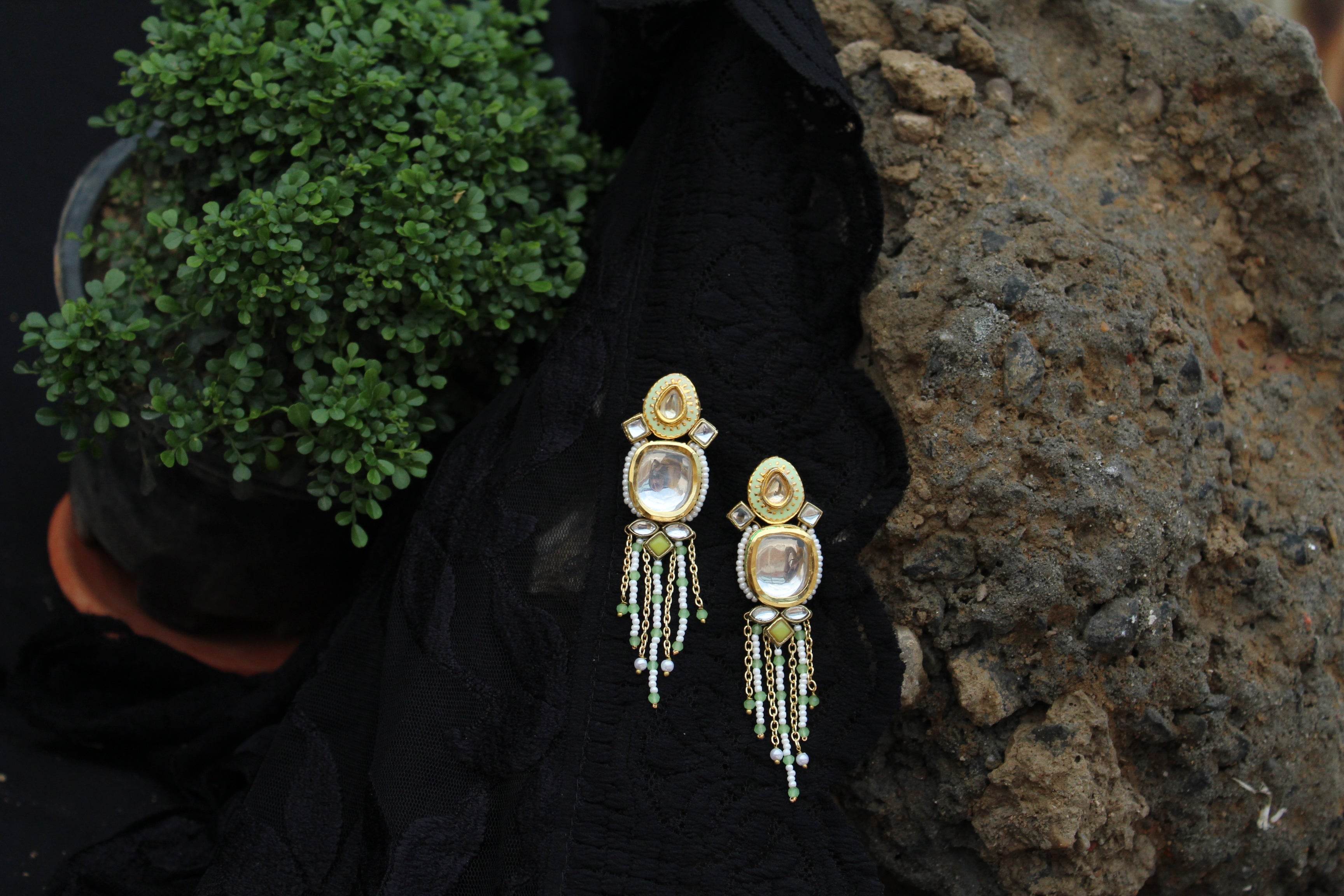 Traditional Kundan earrings in gold-tone, perfect for weddings and festive wear