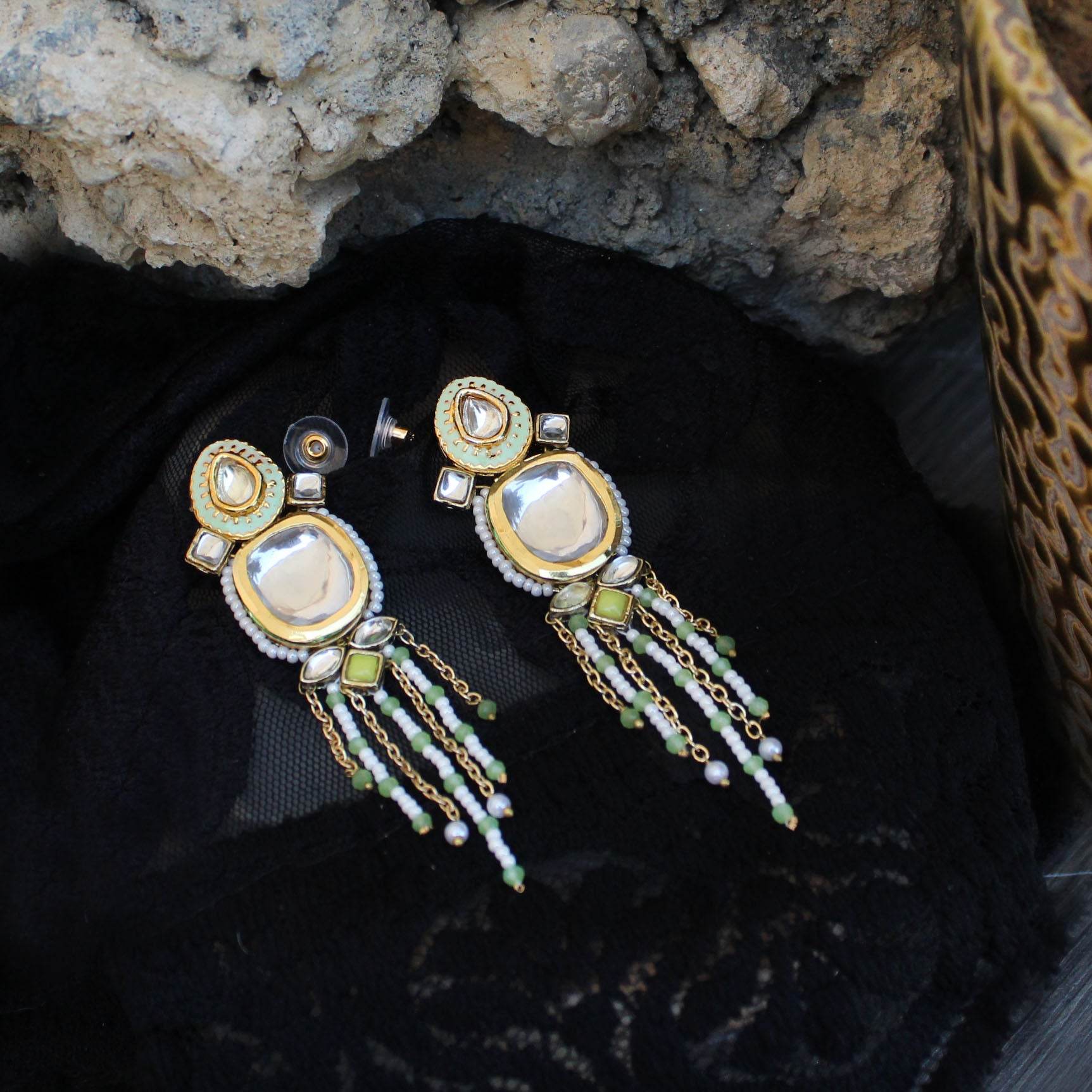 Traditional Kundan earrings in gold-tone, perfect for weddings and festive wear