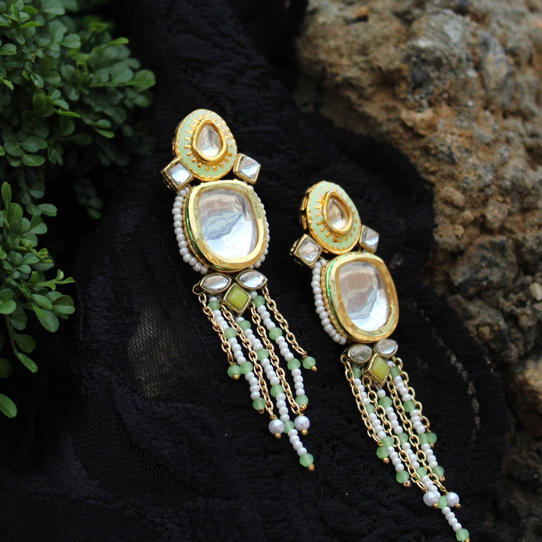 Traditional Kundan earrings in gold-tone, perfect for weddings and festive wear