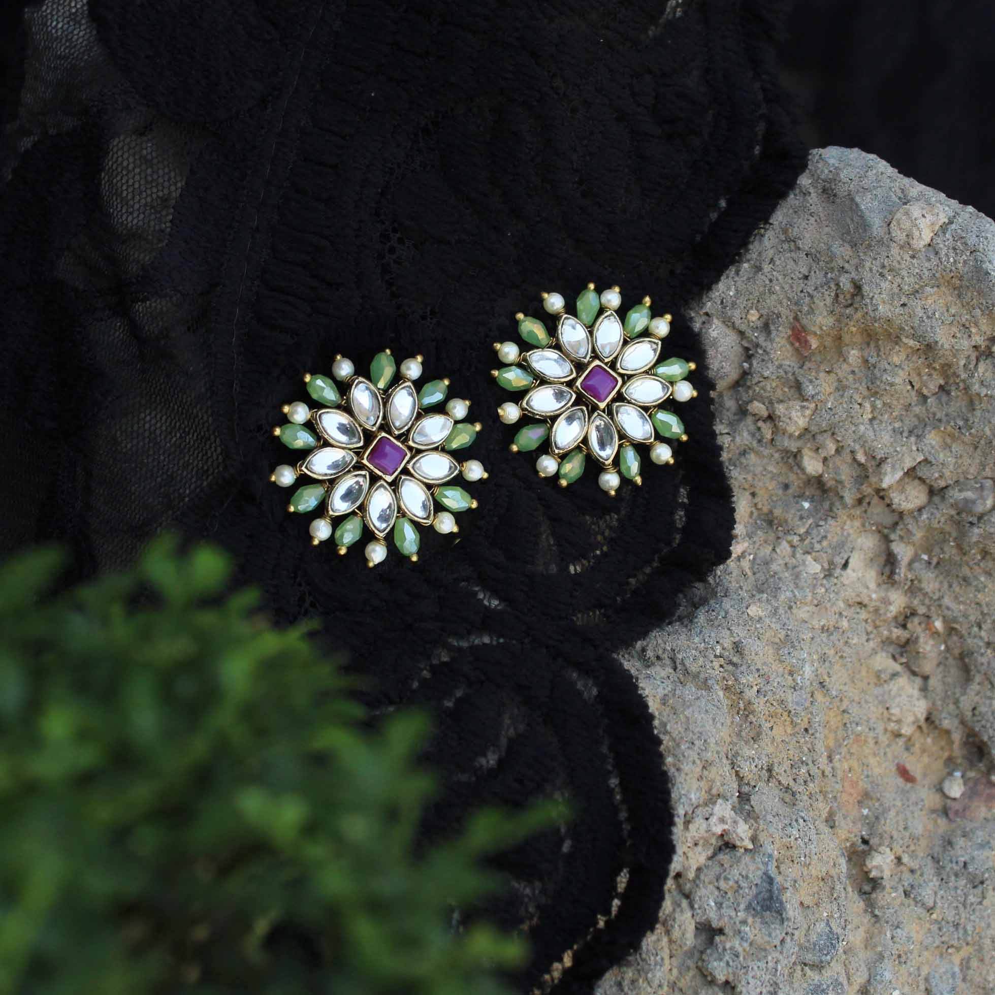 Traditional Kundan earrings in gold-tone, perfect for weddings and festive wear