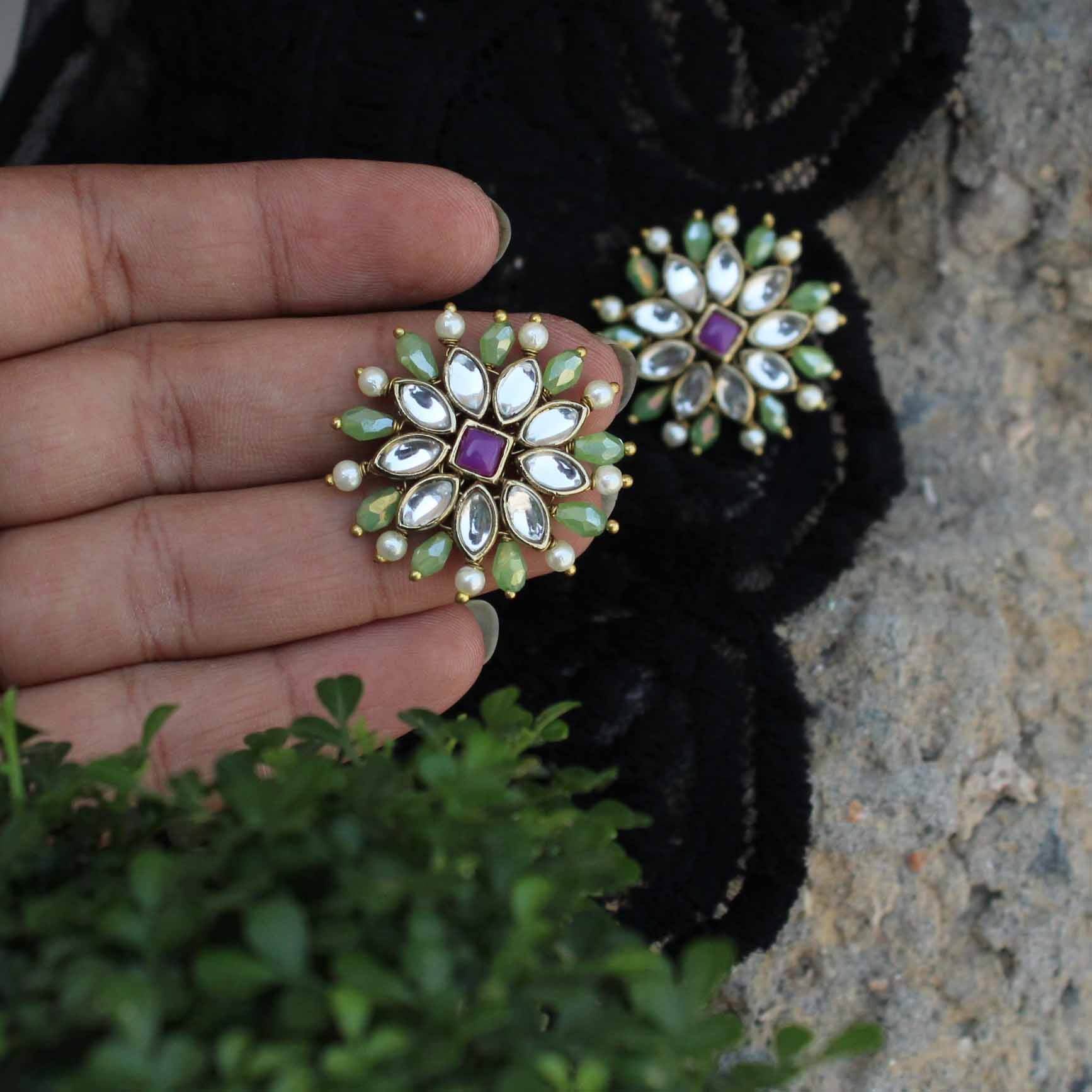 Traditional Kundan earrings in gold-tone, perfect for weddings and festive wear