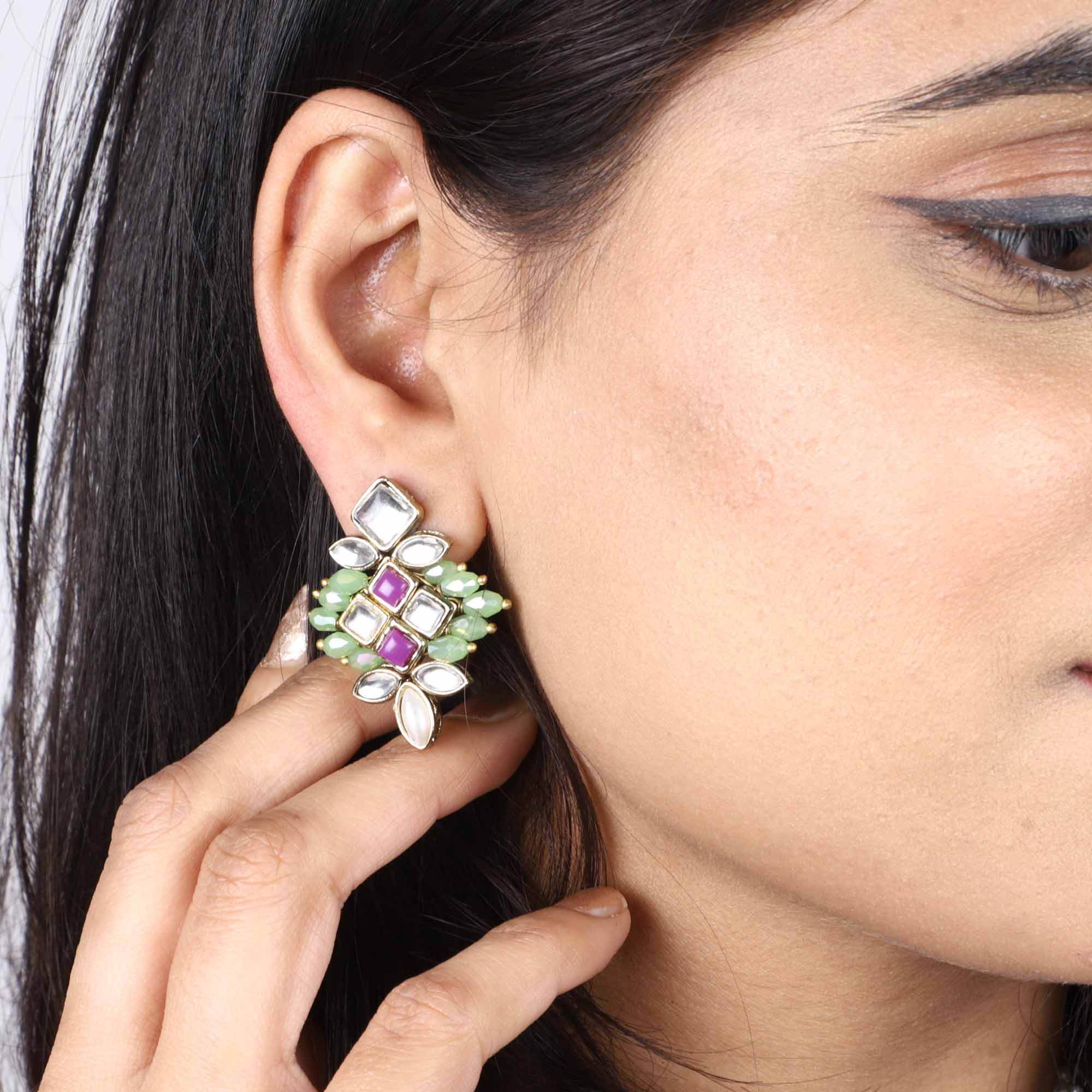 Traditional Kundan earrings in gold-tone, perfect for weddings and festive wear