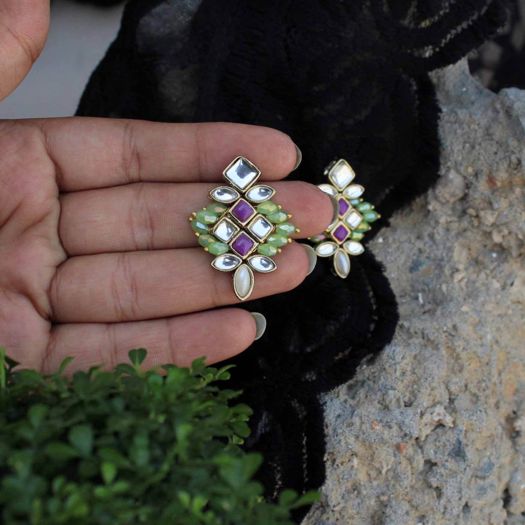 Traditional Kundan earrings in gold-tone, perfect for weddings and festive wear