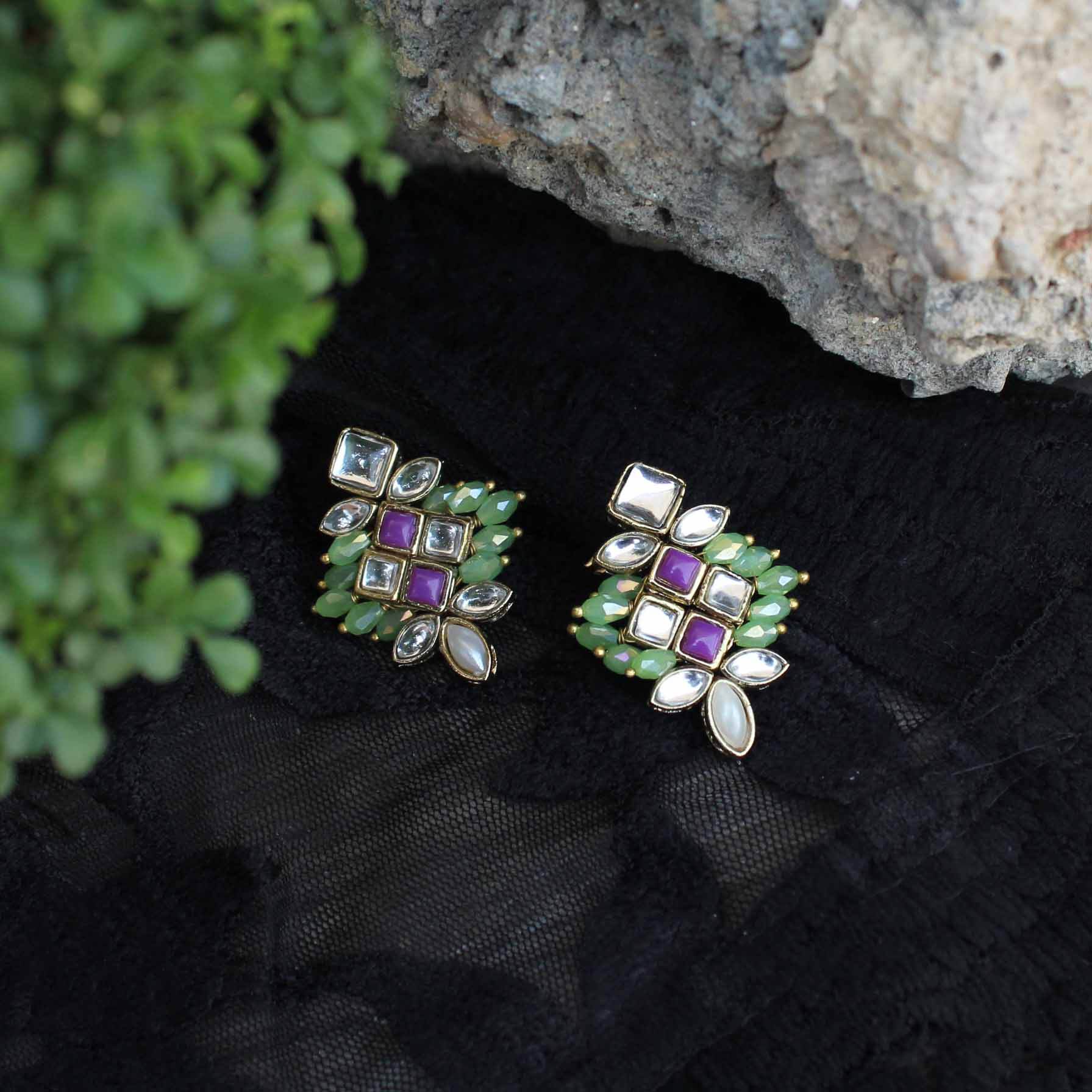 Traditional Kundan earrings in gold-tone, perfect for weddings and festive wear