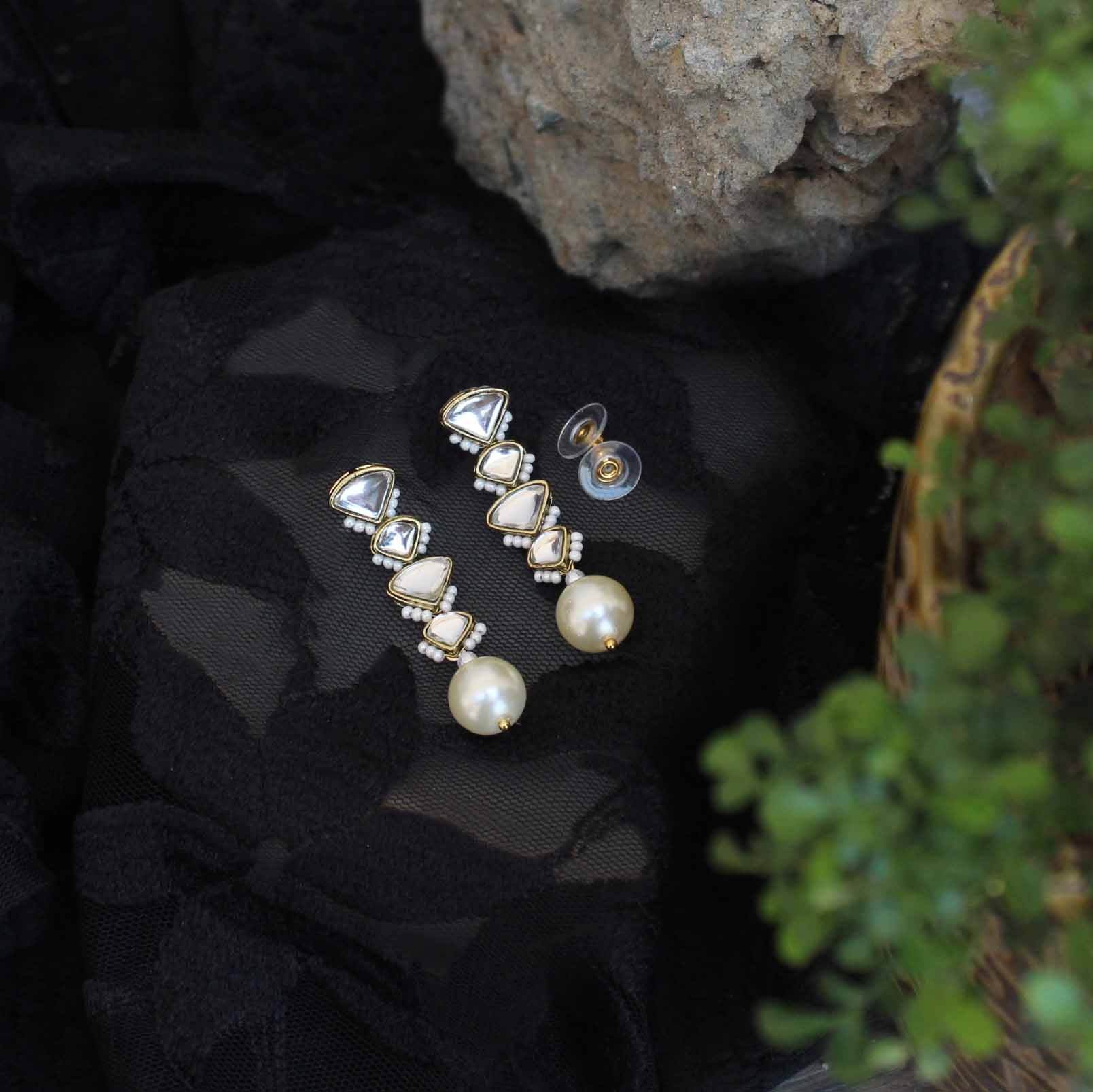 Traditional Kundan earrings in gold-tone, perfect for weddings and festive wear