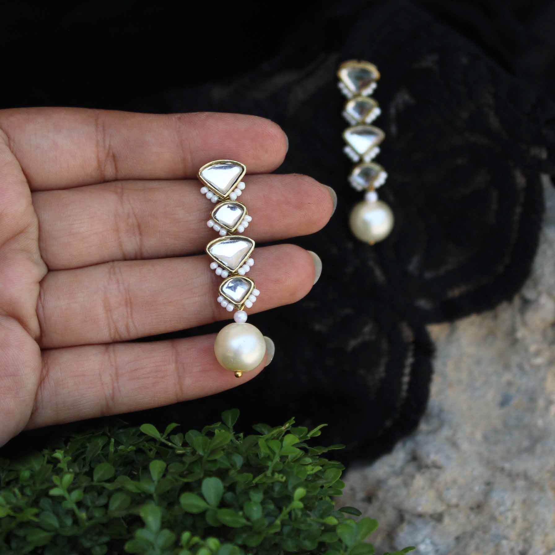 Traditional Kundan earrings in gold-tone, perfect for weddings and festive wear