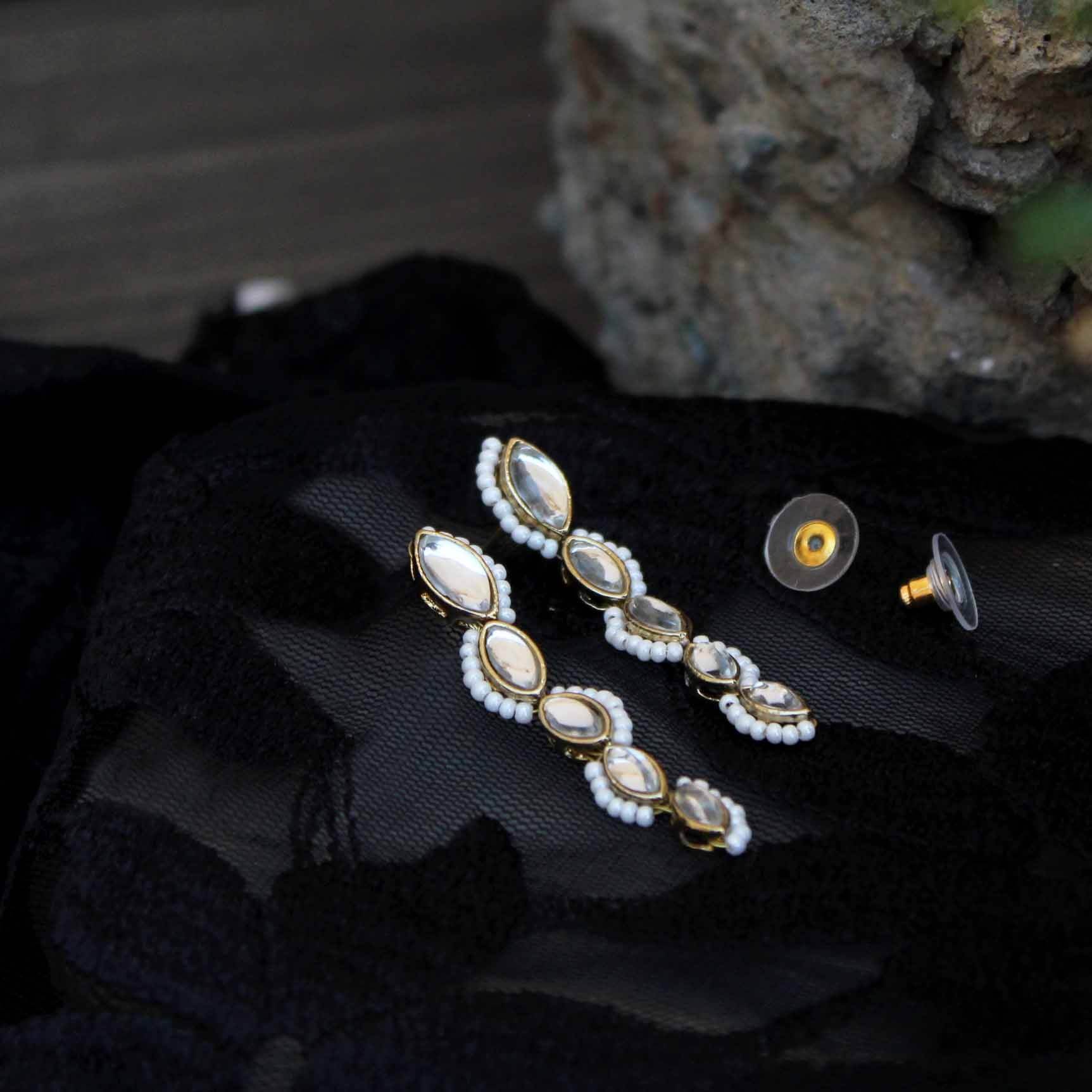 Traditional Kundan earrings in gold-tone, perfect for weddings and festive wear