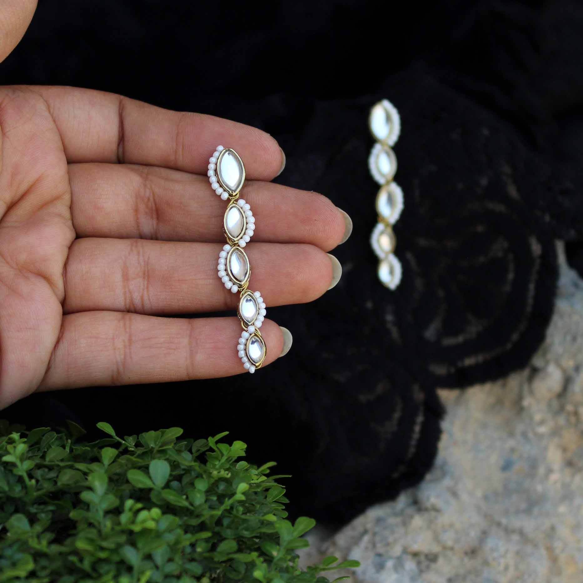 Traditional Kundan earrings in gold-tone, perfect for weddings and festive wear