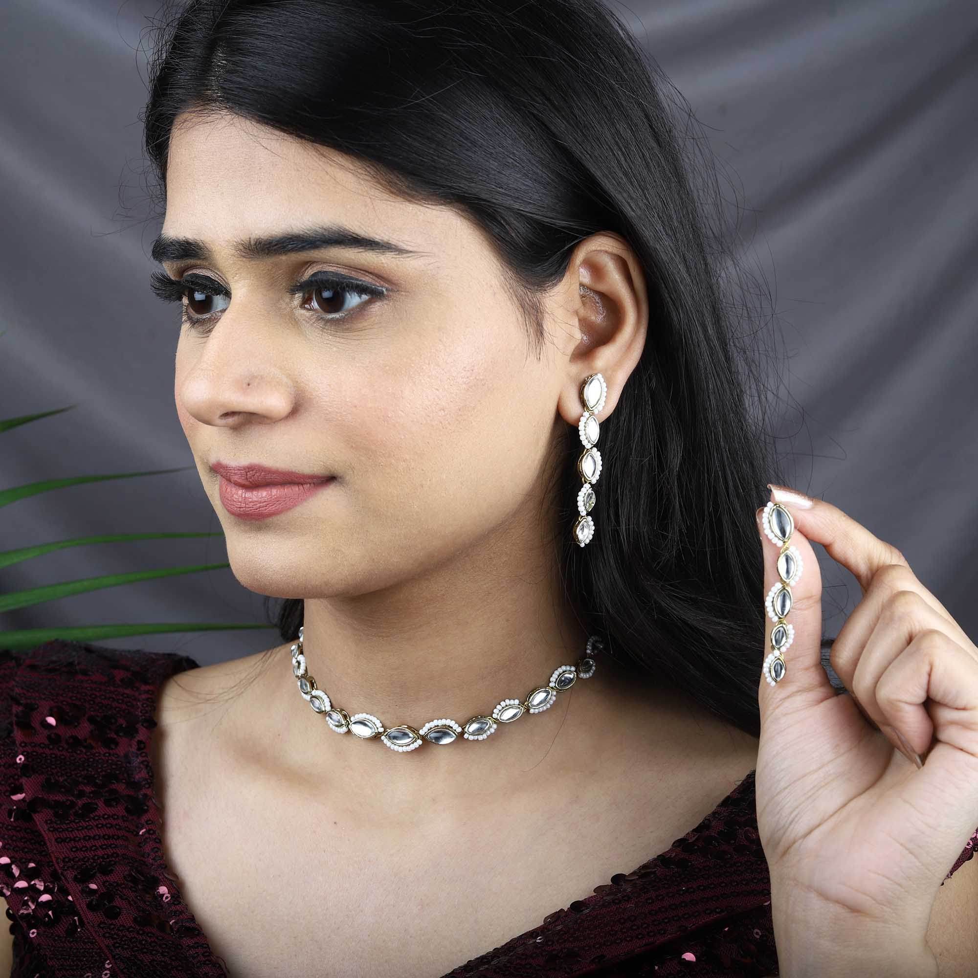 Traditional Kundan earrings in gold-tone, perfect for weddings and festive wear