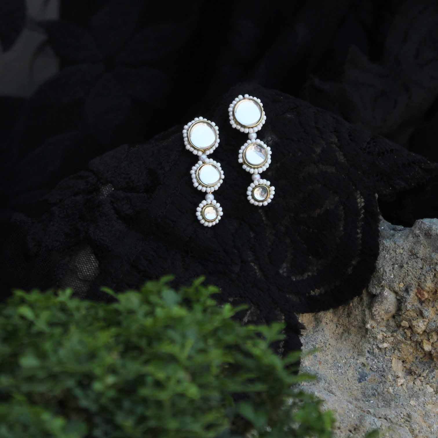 Traditional Kundan earrings in gold-tone, perfect for weddings and festive wear