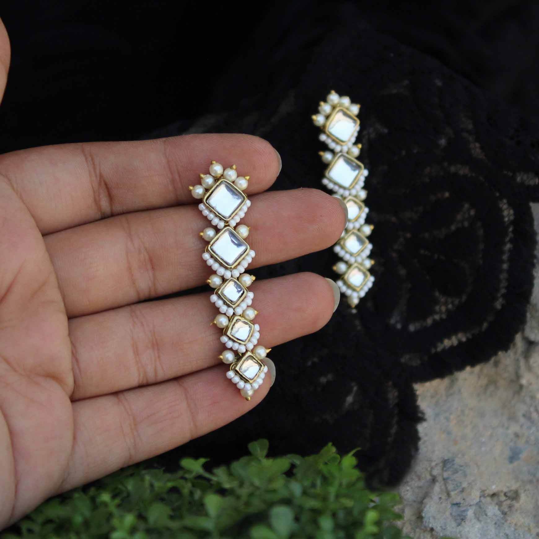 Traditional Kundan earrings in gold-tone, perfect for weddings and festive wear