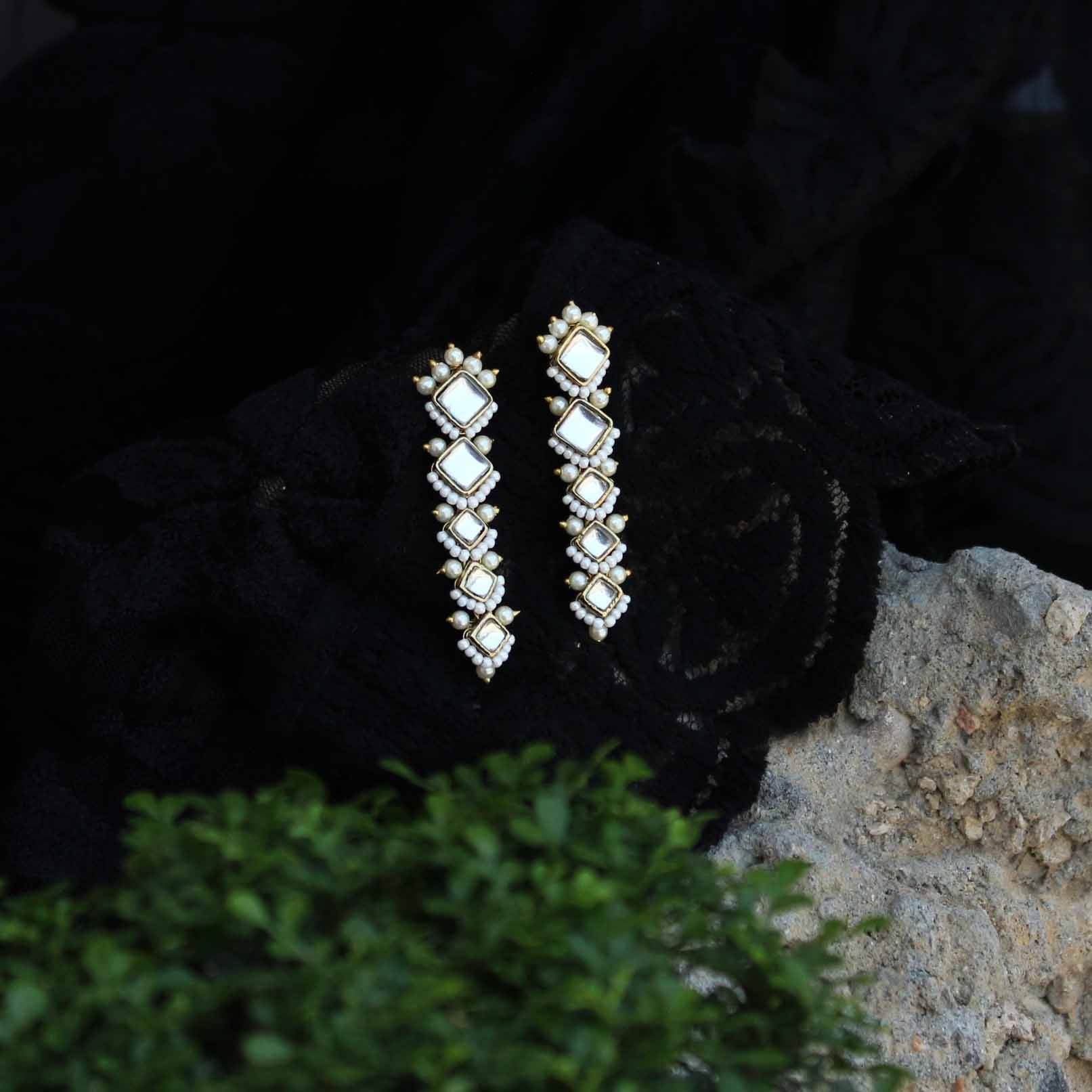 Traditional Kundan earrings in gold-tone, perfect for weddings and festive wear