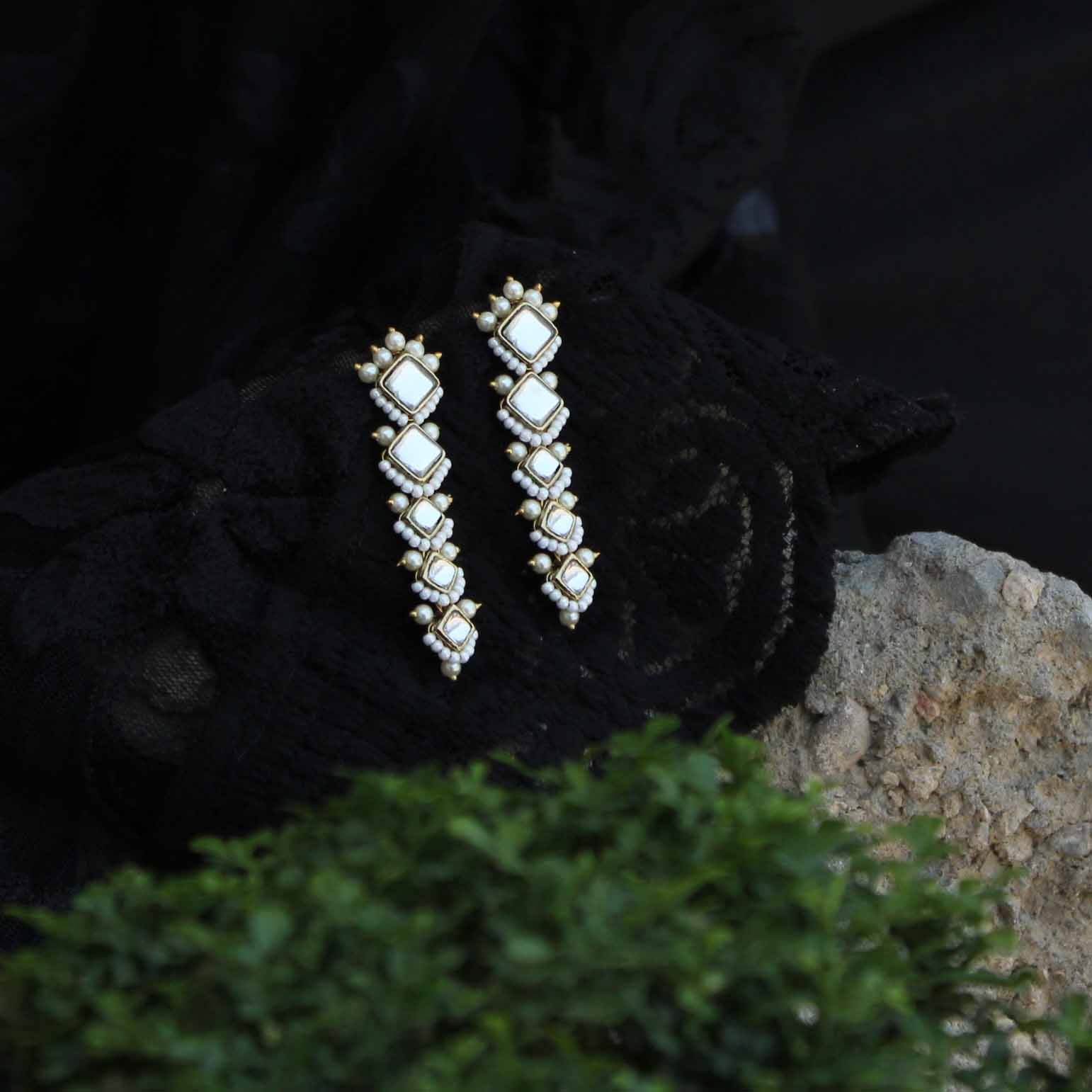 Traditional Kundan earrings in gold-tone, perfect for weddings and festive wear