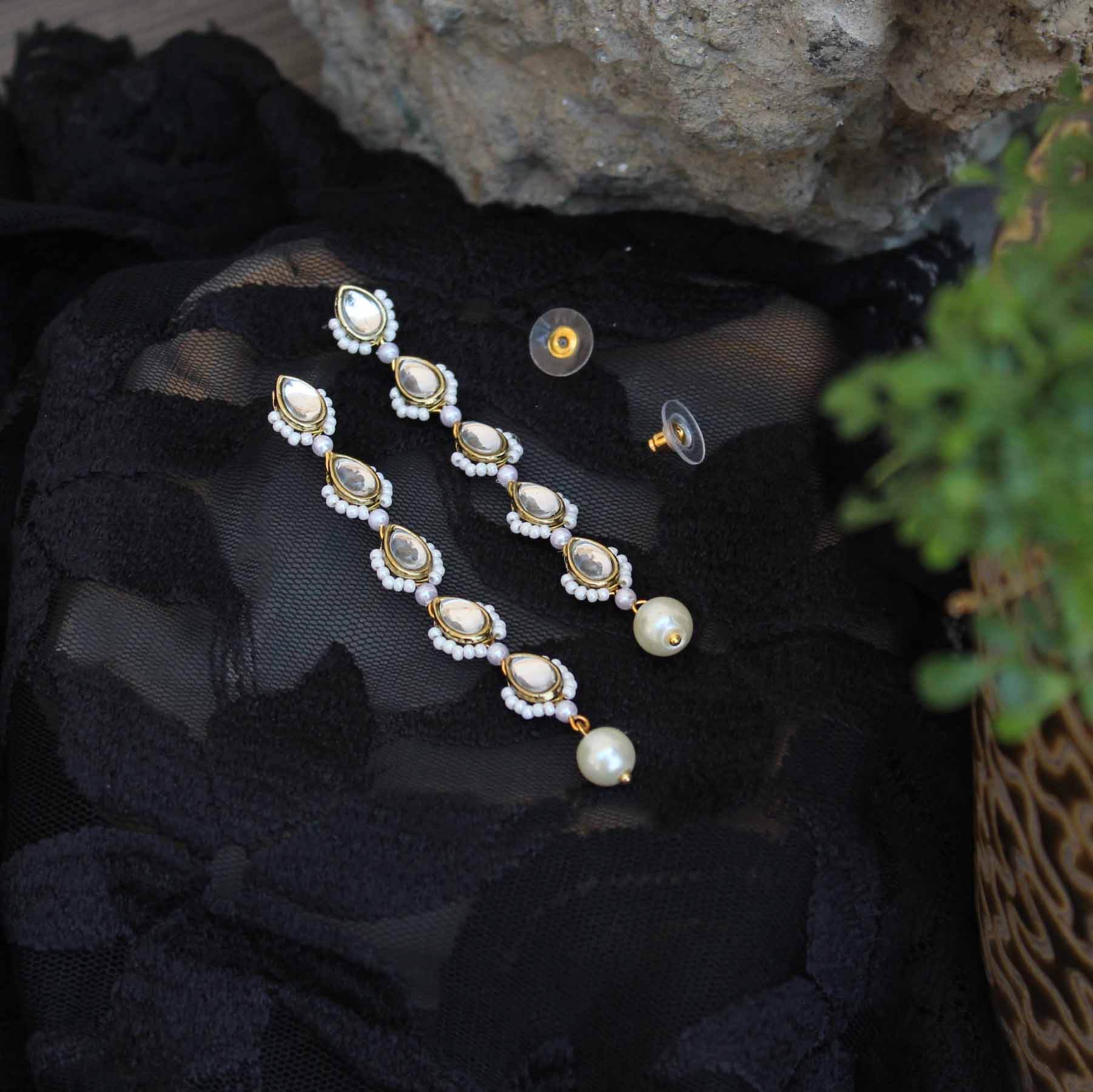 Traditional Kundan earrings in gold-tone, perfect for weddings and festive wear