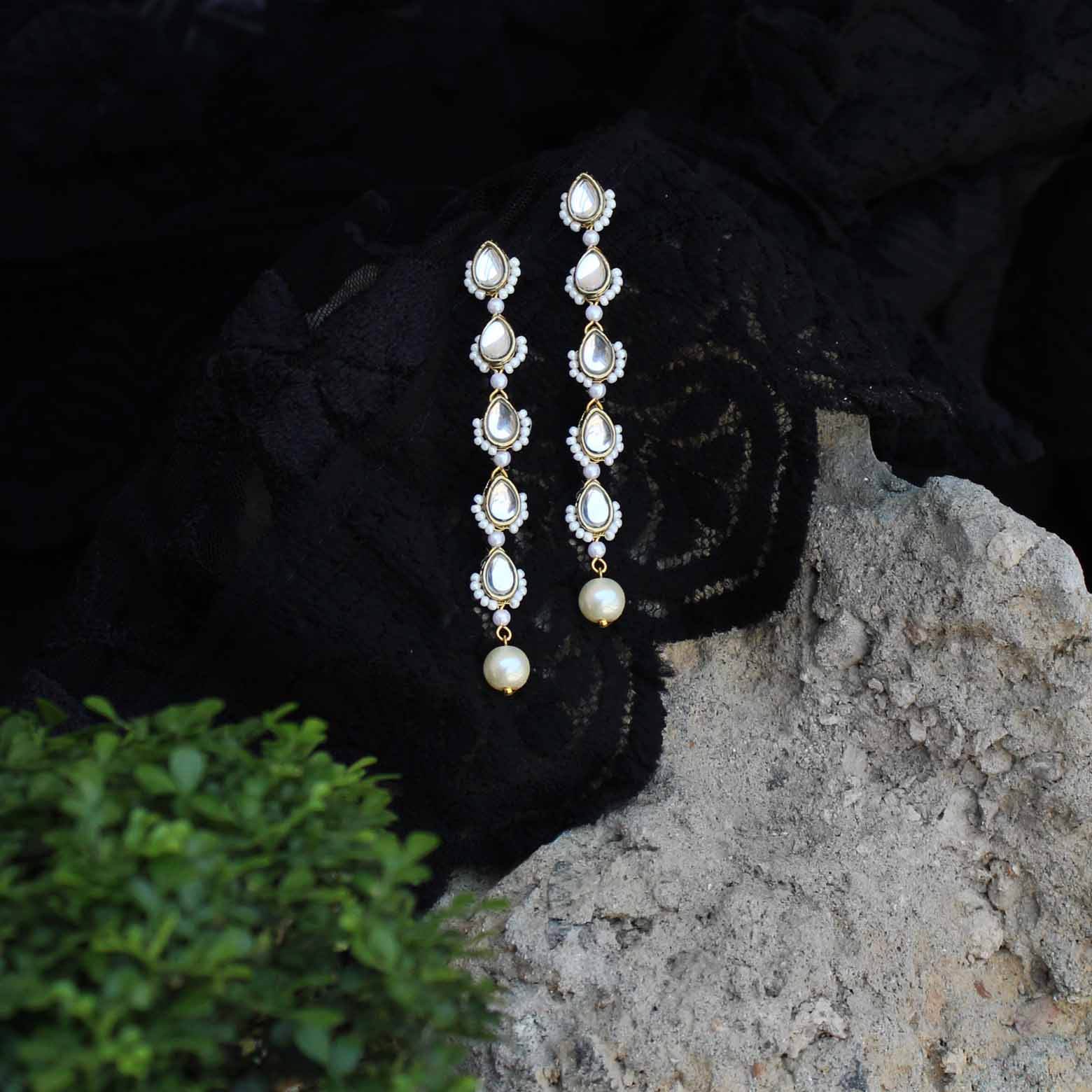 Traditional Kundan earrings in gold-tone, perfect for weddings and festive wear