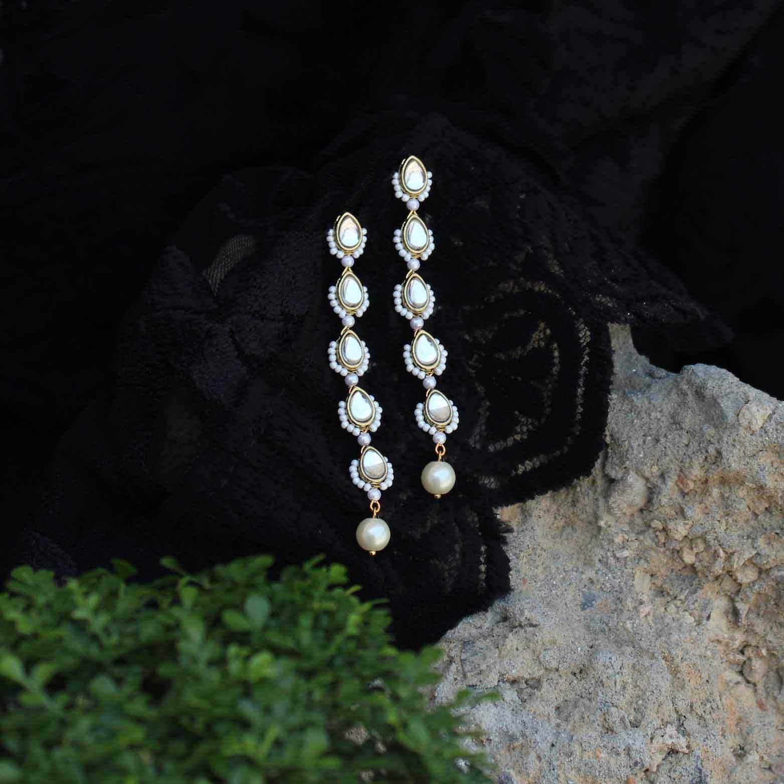 Traditional Kundan earrings in gold-tone, perfect for weddings and festive wear