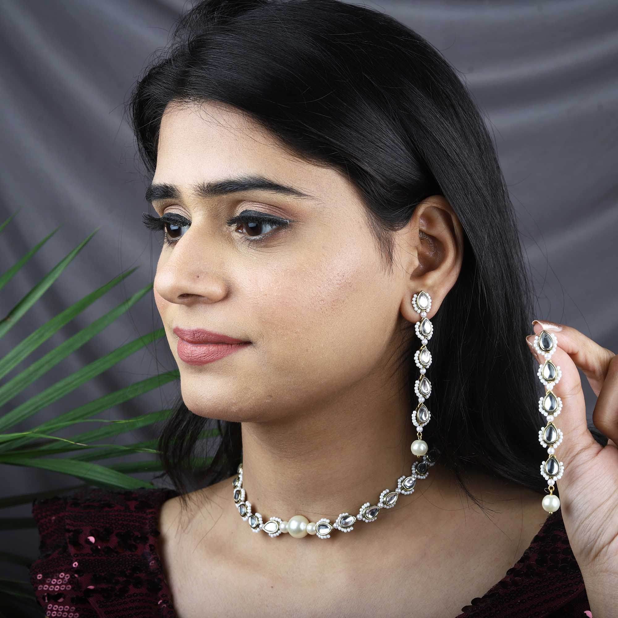 Traditional Kundan earrings in gold-tone, perfect for weddings and festive wear