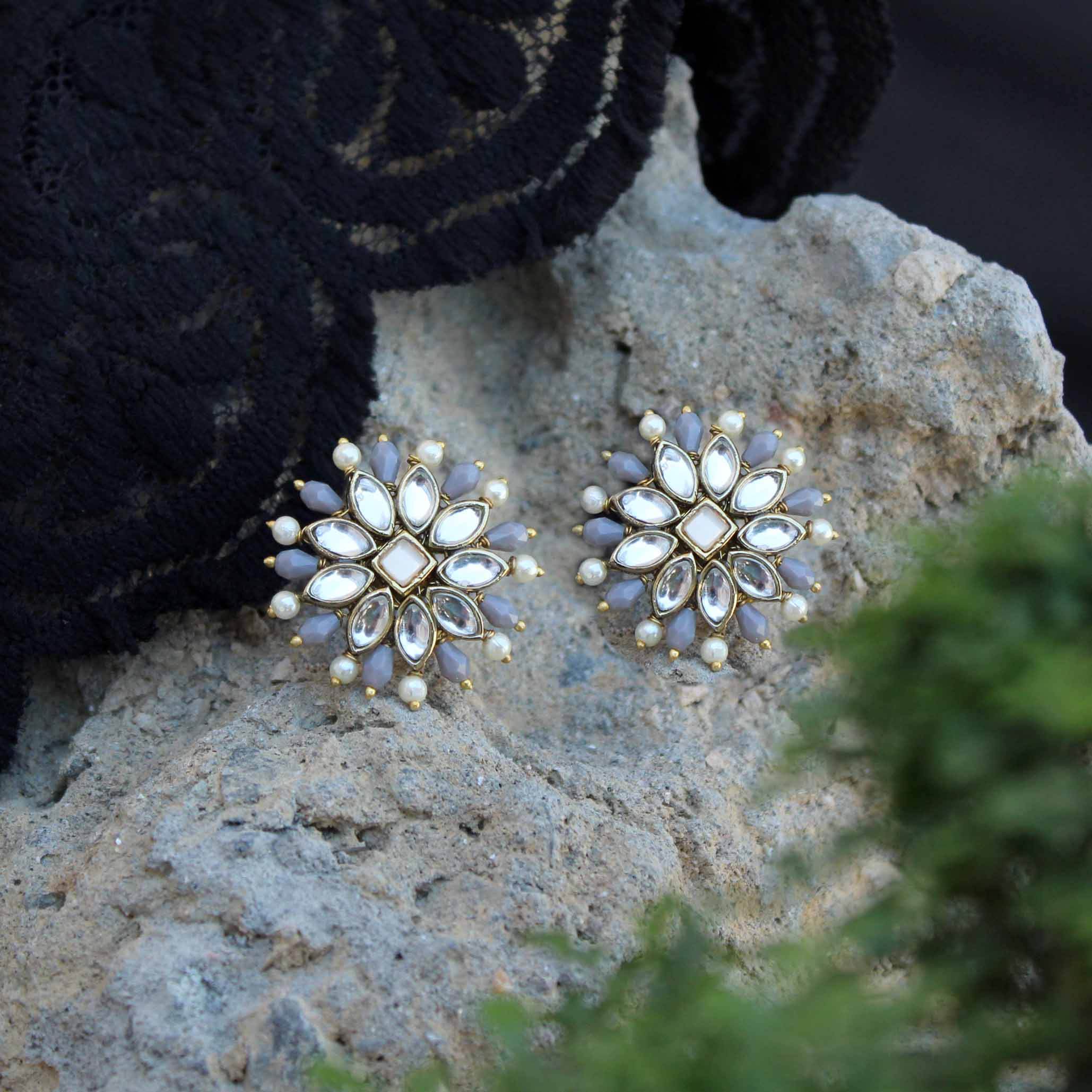Traditional Kundan earrings in gold-tone, perfect for weddings and festive wear