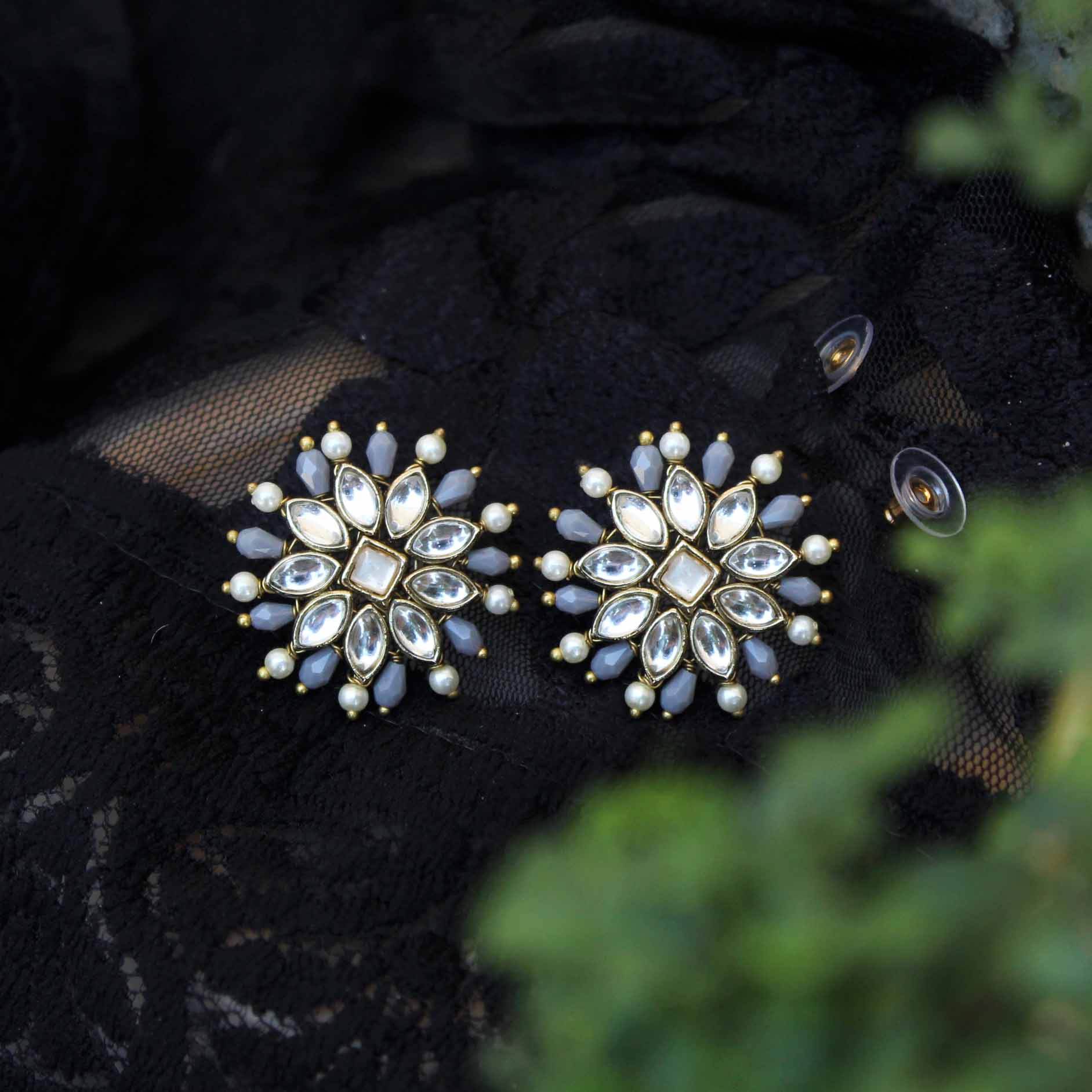 Traditional Kundan earrings in gold-tone, perfect for weddings and festive wear
