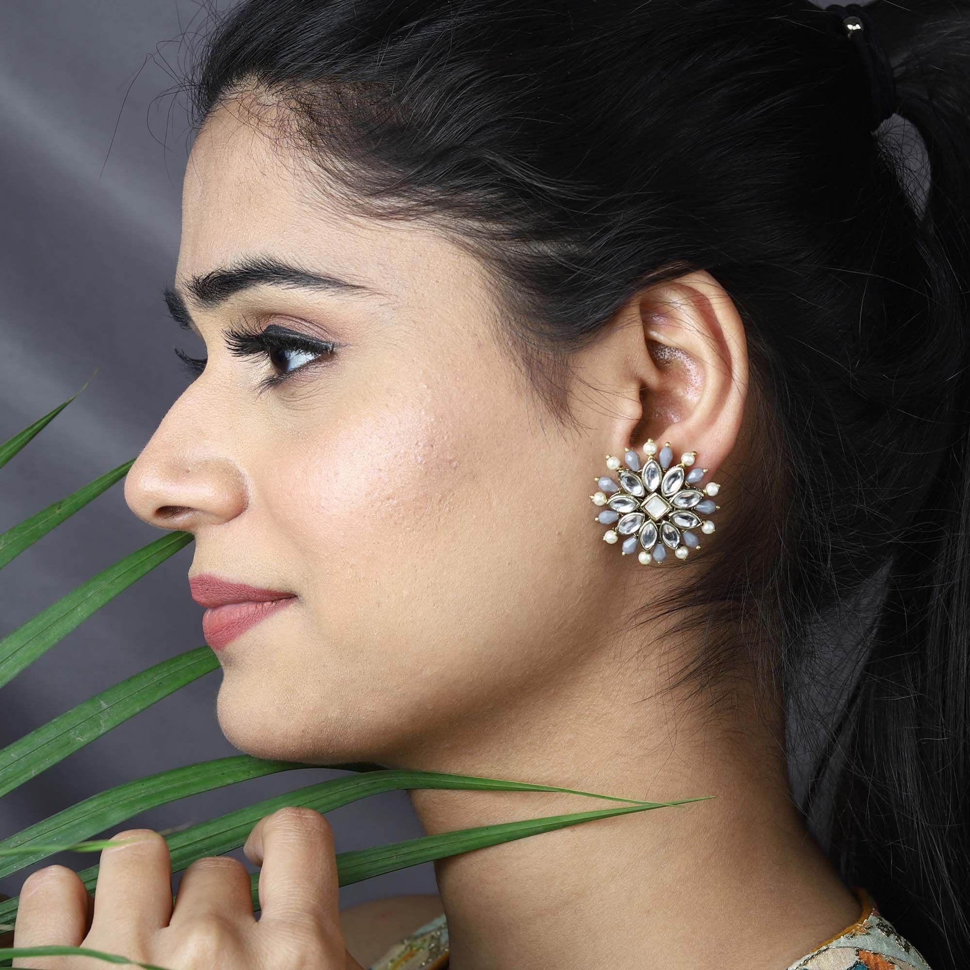 Traditional Kundan earrings in gold-tone, perfect for weddings and festive wear