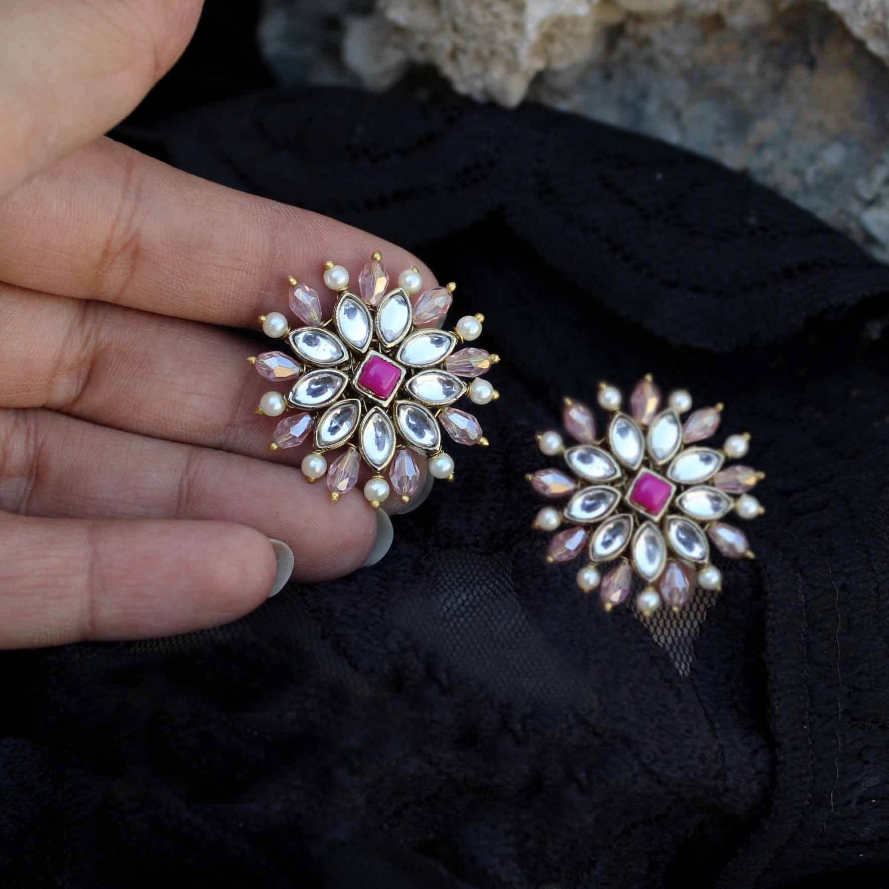 Traditional Kundan earrings in gold-tone, perfect for weddings and festive wear