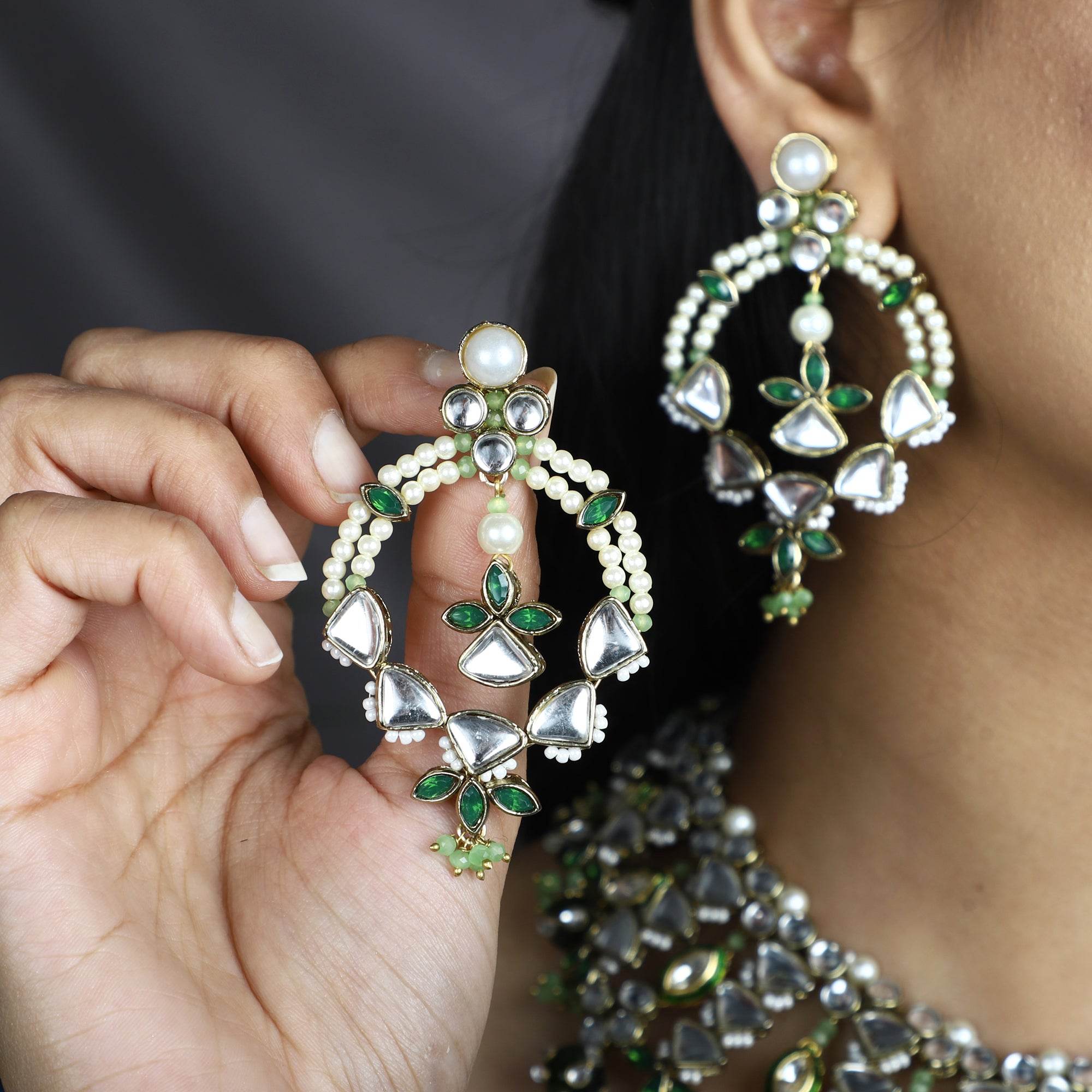 Traditional Kundan earrings in gold-tone, perfect for weddings and festive wear