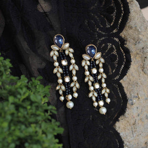 Traditional Kundan earrings in gold-tone, perfect for weddings and festive wear