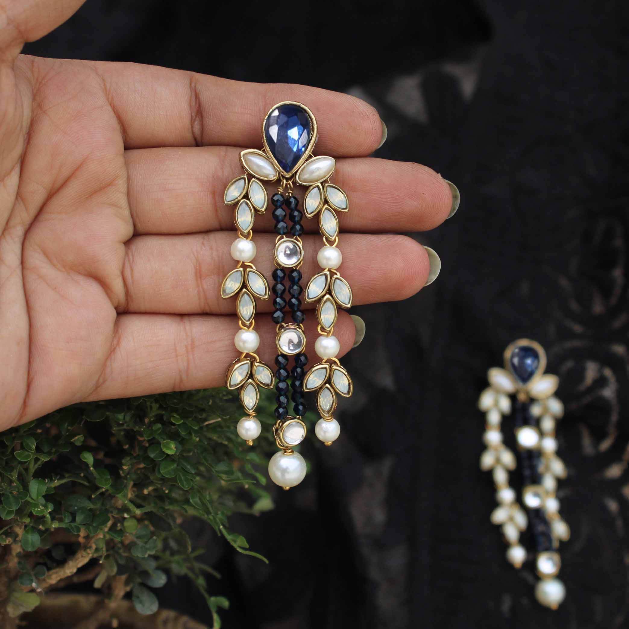 Traditional Kundan earrings in gold-tone, perfect for weddings and festive wear