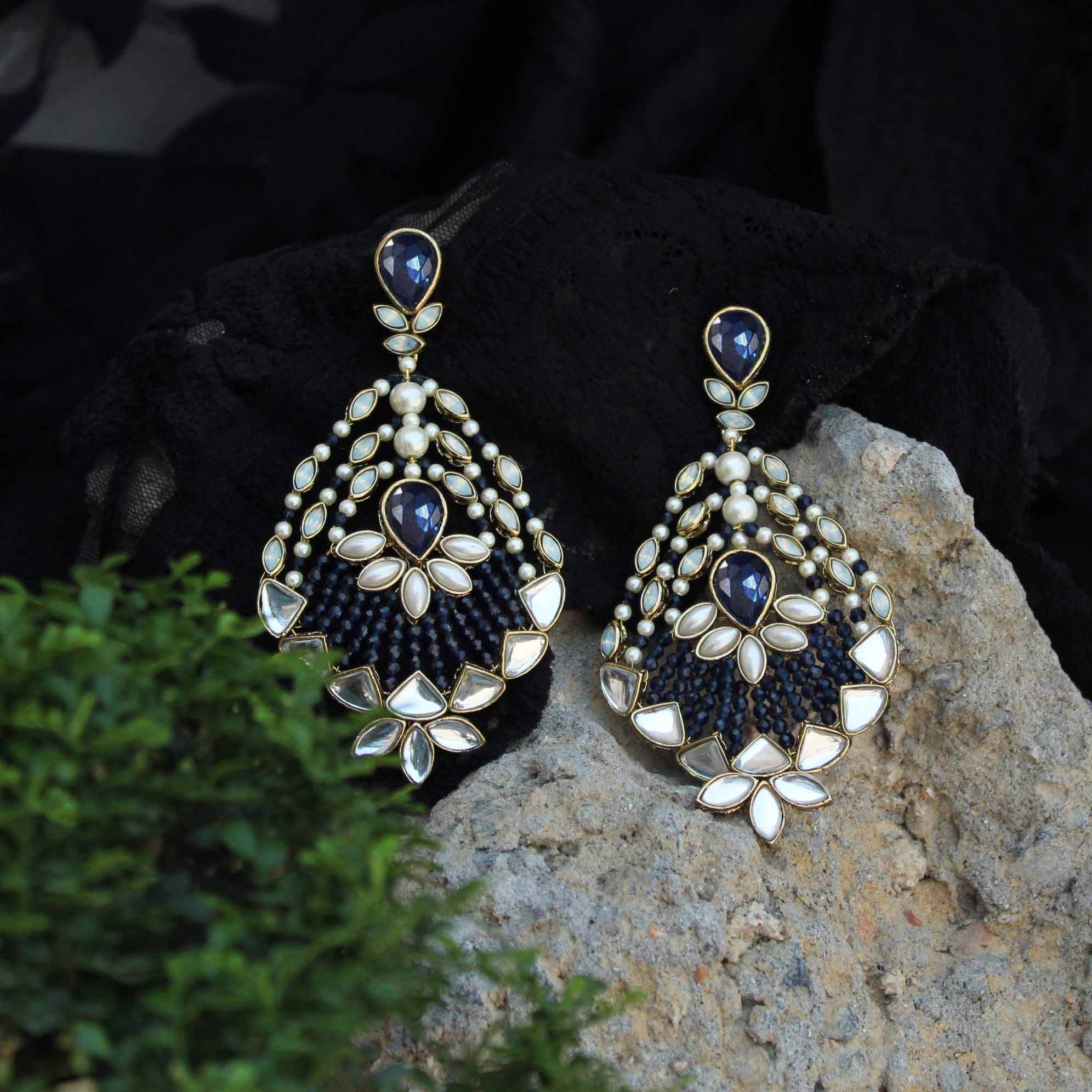 Traditional Kundan earrings in gold-tone, perfect for weddings and festive wear