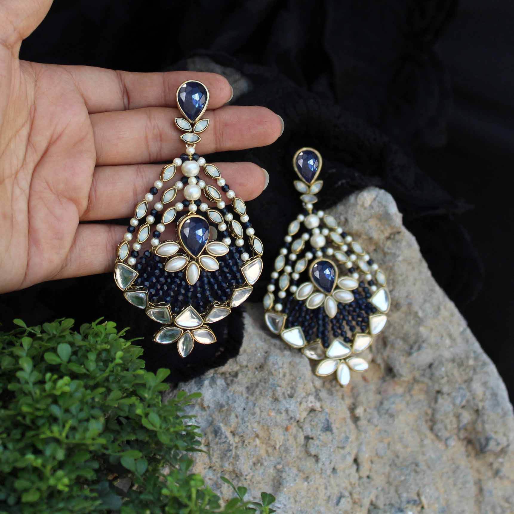 Traditional Kundan earrings in gold-tone, perfect for weddings and festive wear