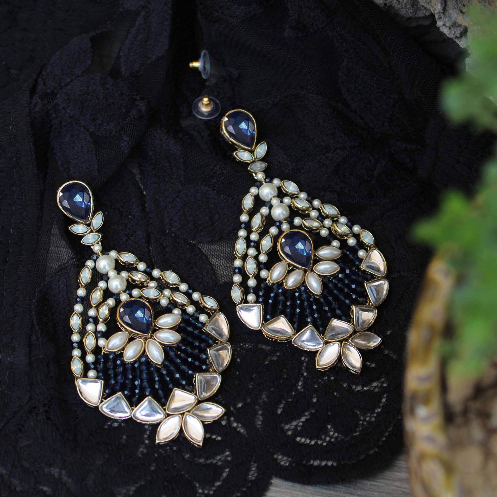 Traditional Kundan earrings in gold-tone, perfect for weddings and festive wear