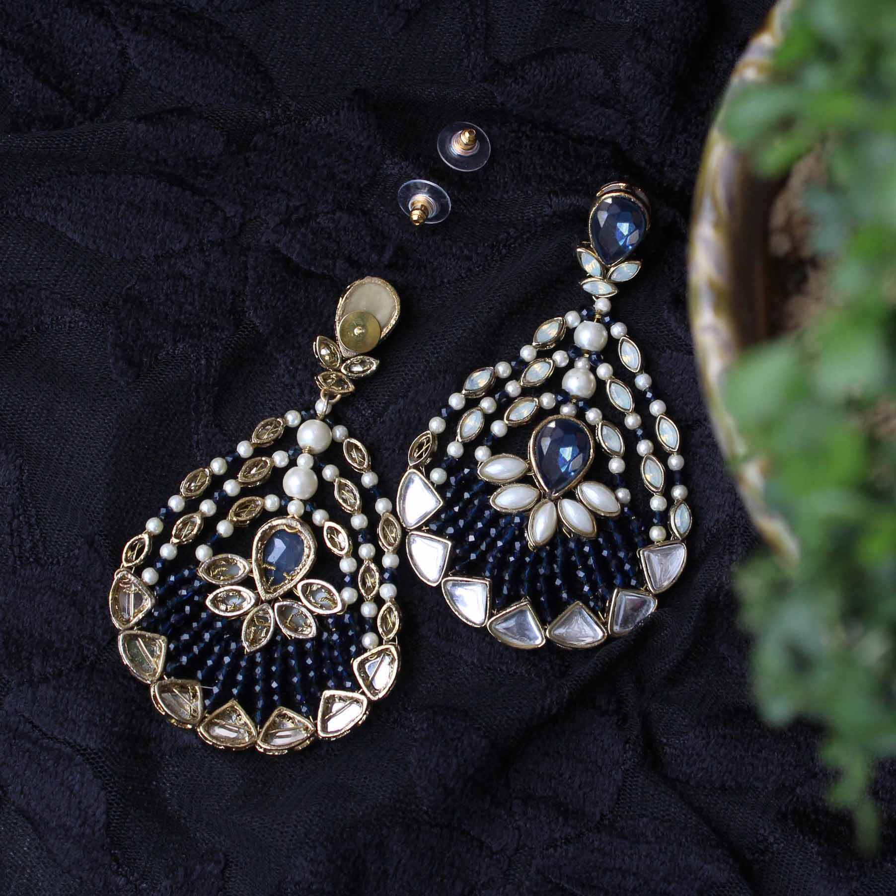 Traditional Kundan earrings in gold-tone, perfect for weddings and festive wear