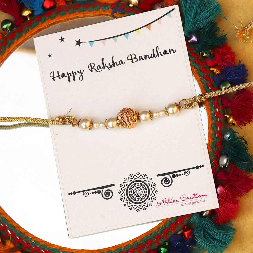 Set Of 3 Pearl And Mesh Rakhi