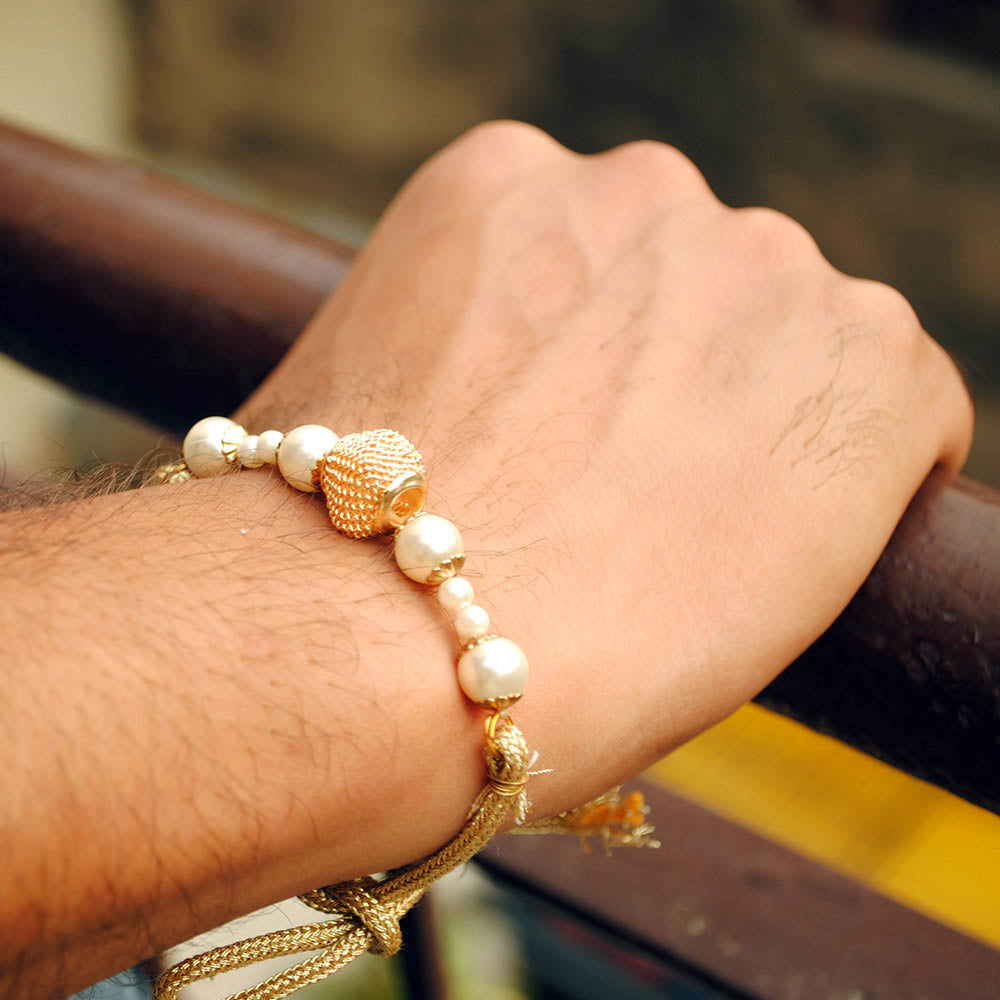 Set Of 3 Pearl And Mesh Rakhi