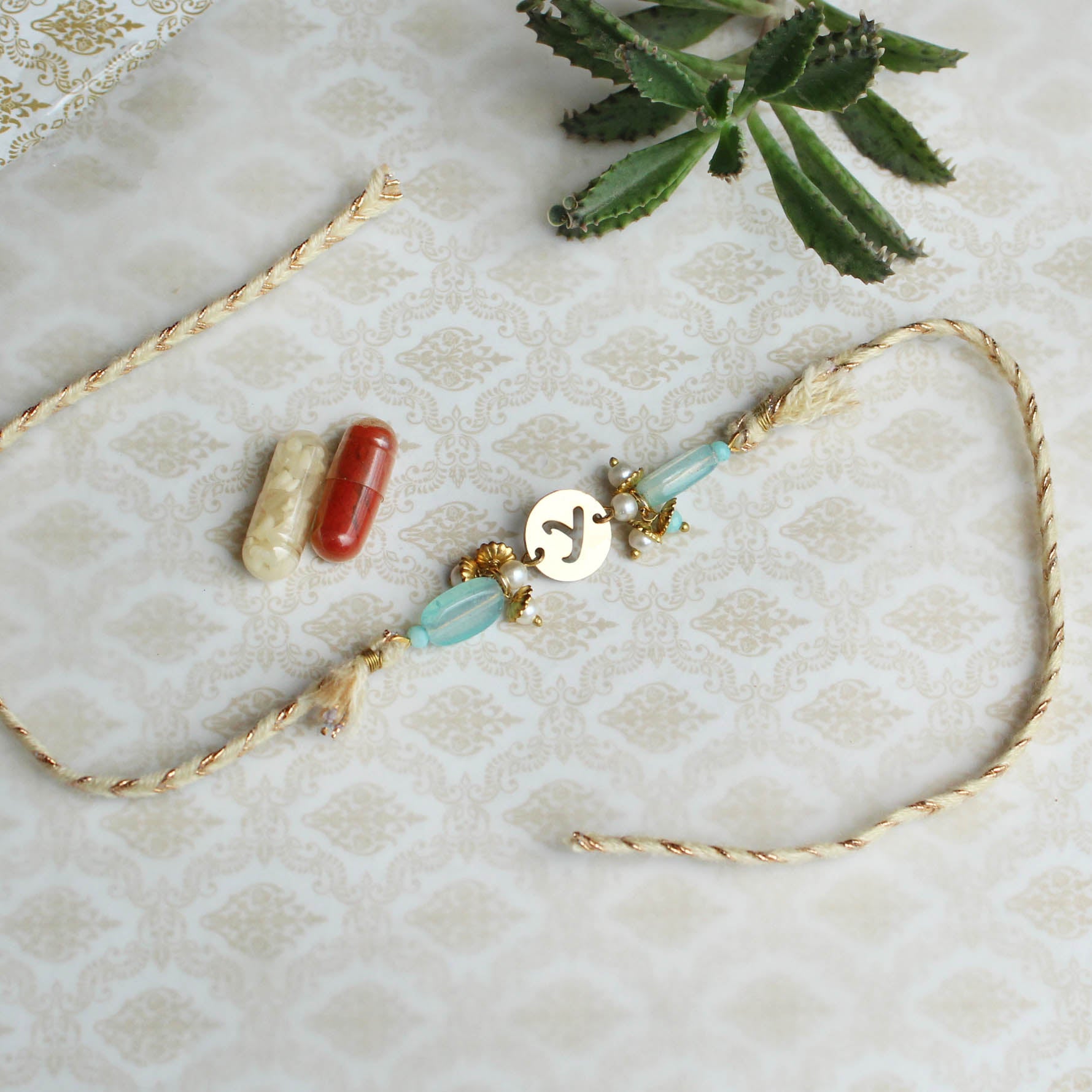 Shades Of Sea Green Stones Personalised Rakhi