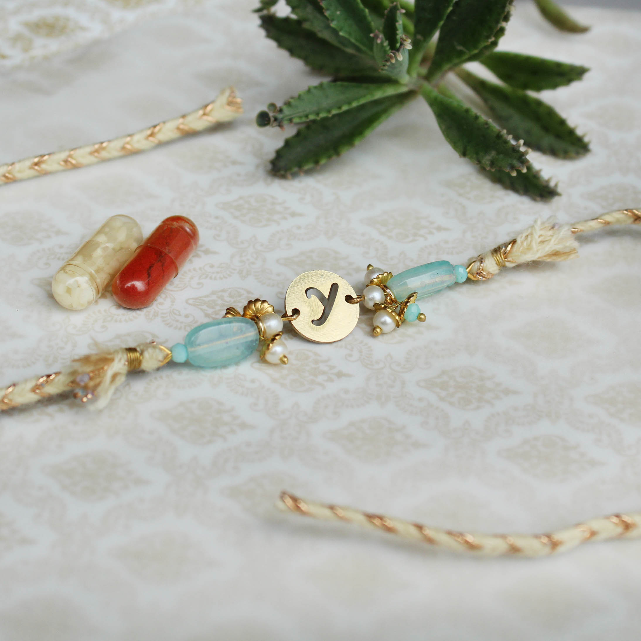 Shades Of Sea Green Stones Personalised Rakhi
