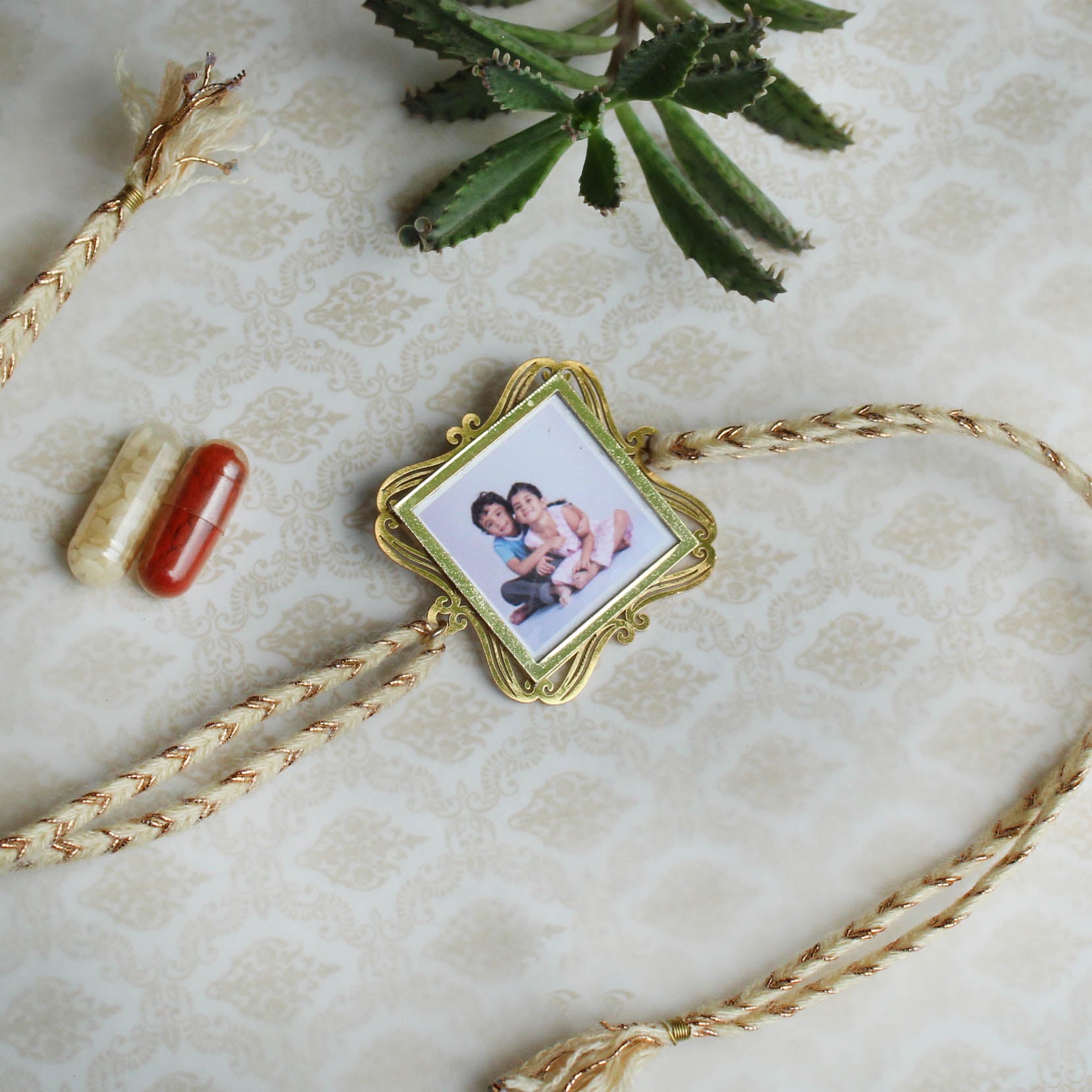BeAbhika Gold Tone Photo Frame Designer Unqiue Famous Rakhi Lightweight Easy To Tie Rakhi Available At Best Price In India Online COD Available Send Rakhi To Brother Small Brother Big Brother Younger Brother Send Rakhi Abroad With Roli Chawal Capsules