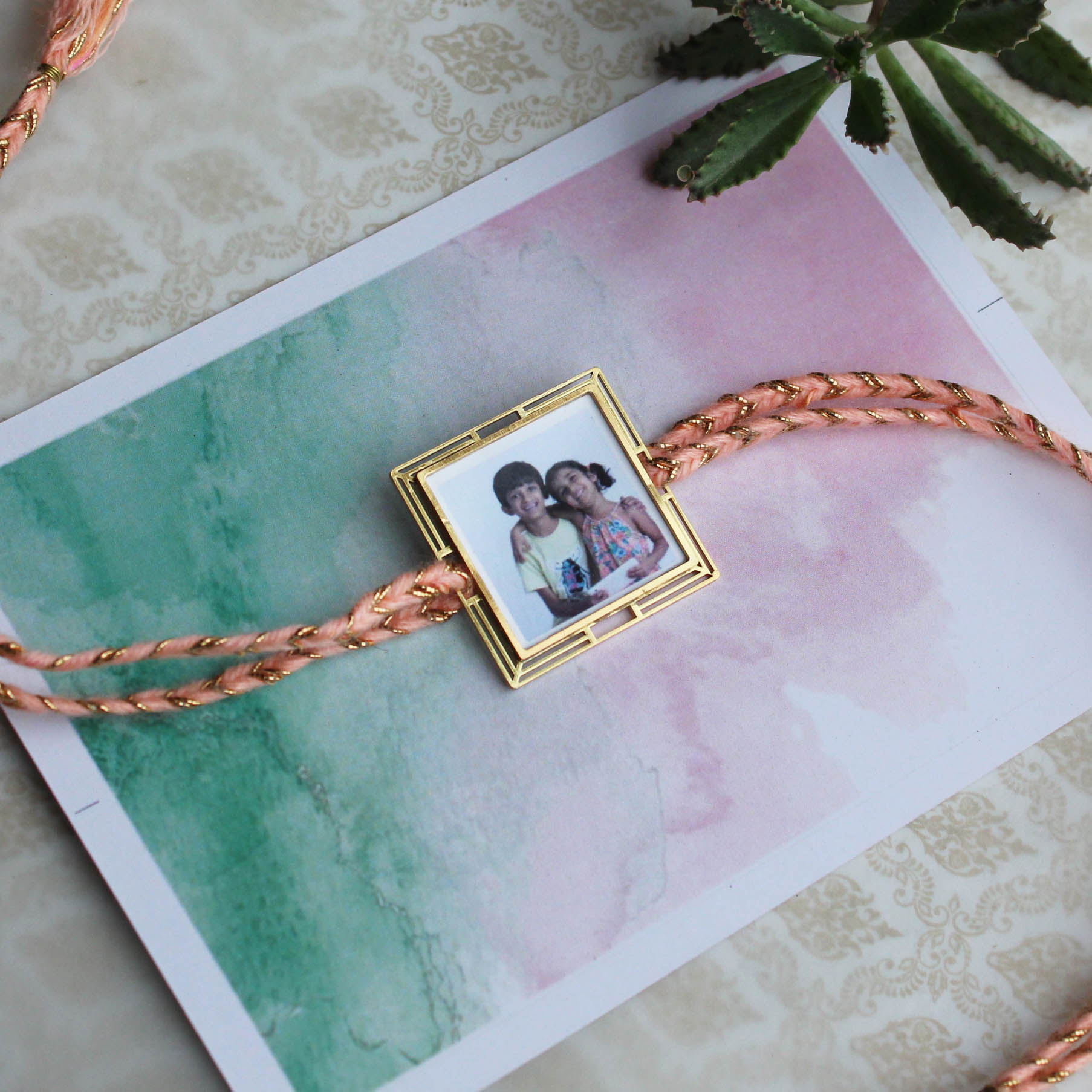 BeAbhika Gold Tone Photo Frame Designer Unqiue Famous Rakhi Lightweight Easy To Tie Rakhi Available At Best Price In India Online COD Available Send Rakhi To Brother Small Brother Big Brother Younger Brother Send Rakhi Abroad With Roli Chawal Capsules